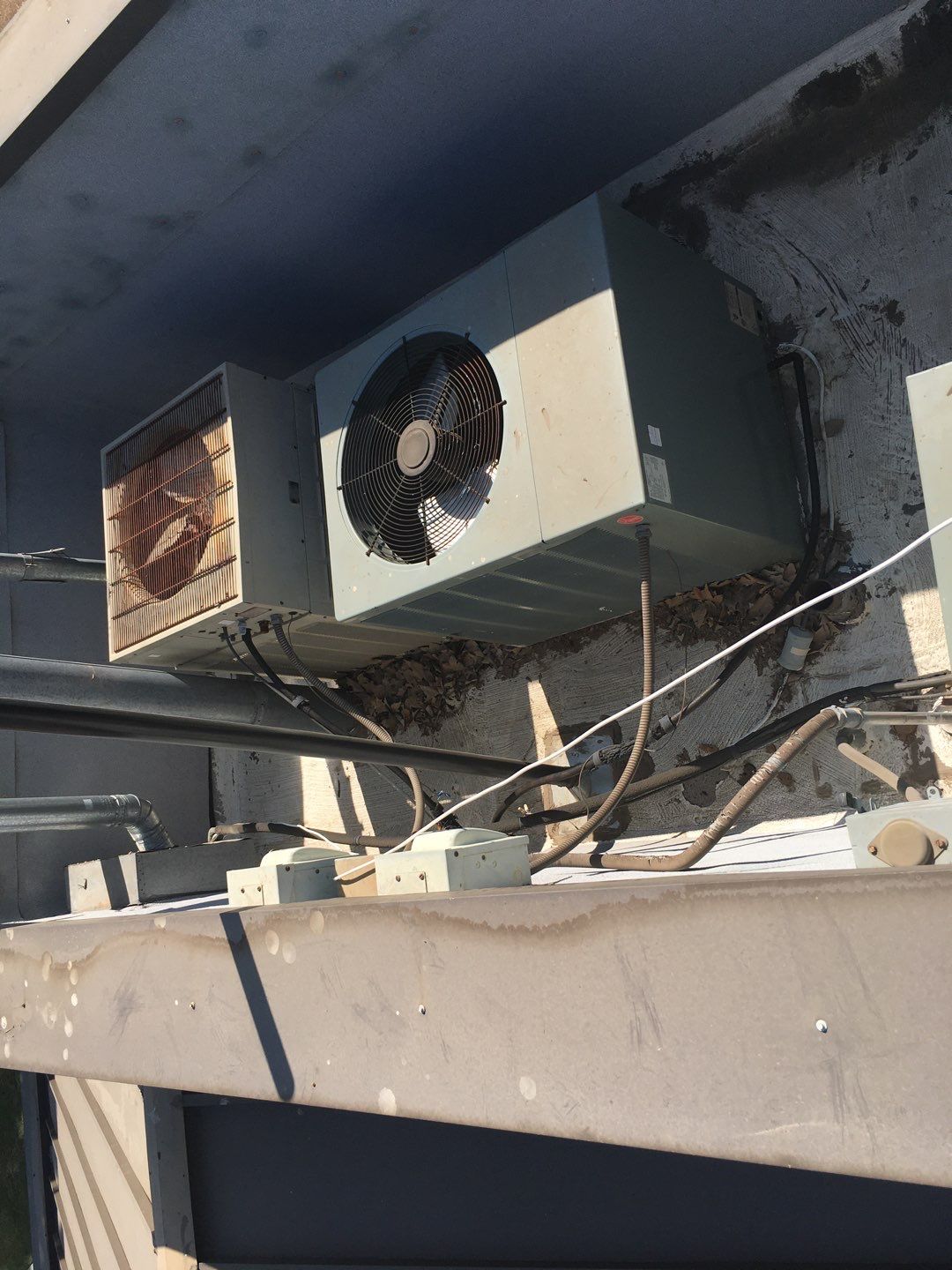 Spray foam and coatings inside commercial building HVAC well using Spray foam and coatings over existing BUR system by Straight Edge Roofing Inc