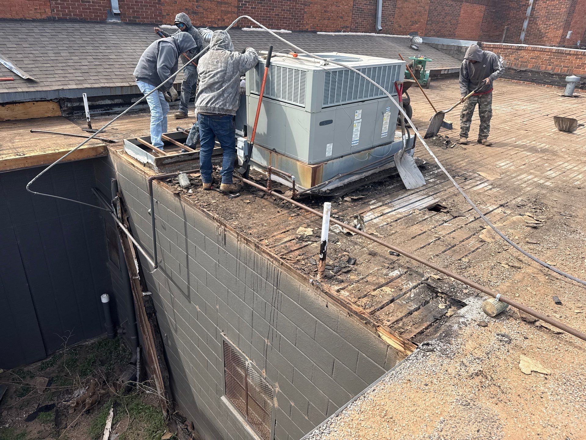 Hollis High School Comprehensive TPO Roof Replacement and Restoration by Secondary Rhodes