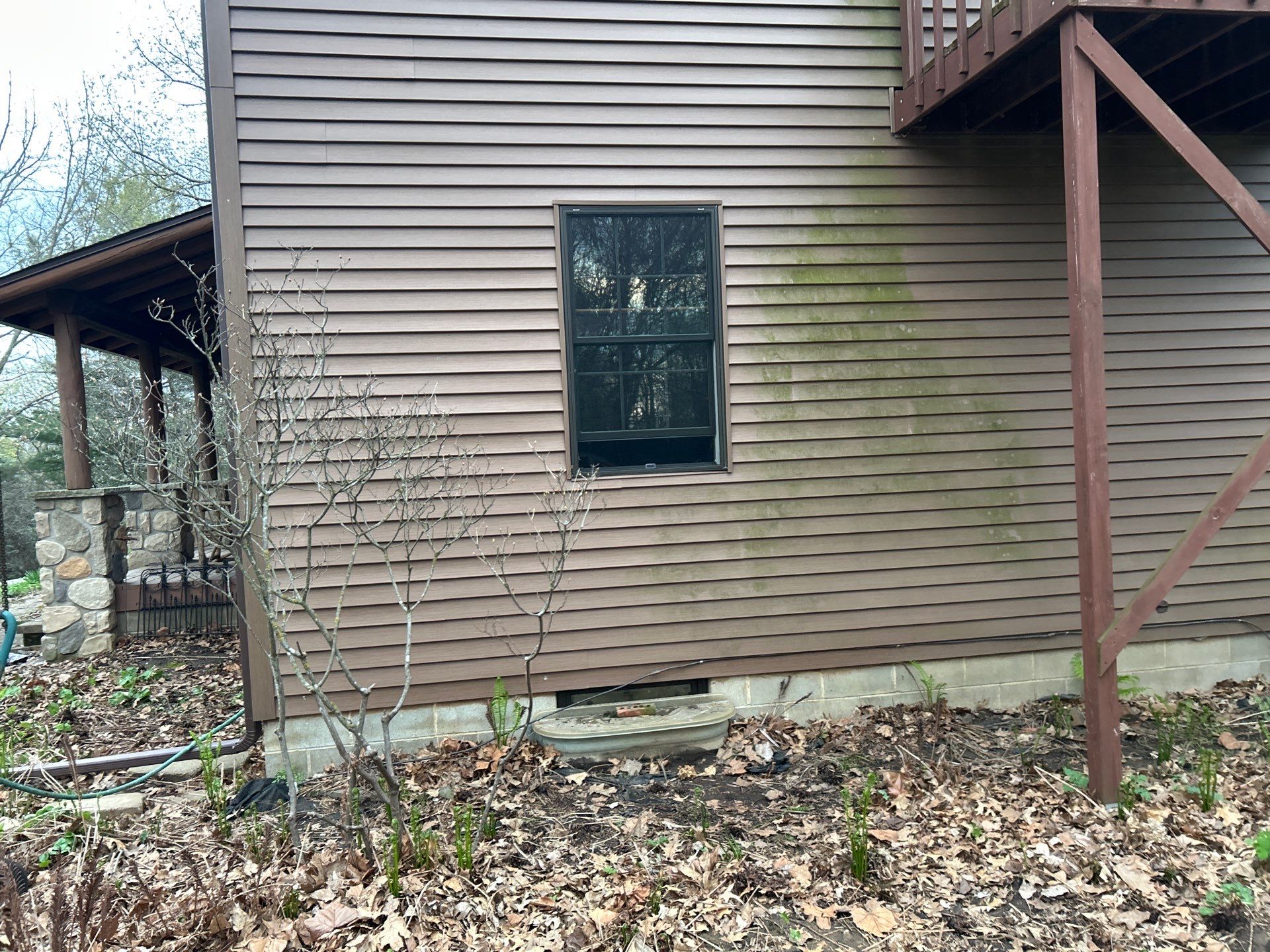 Pella Window installation using Pella Lifestyle wood/Aluminum window by United Windows and Siding LLC
