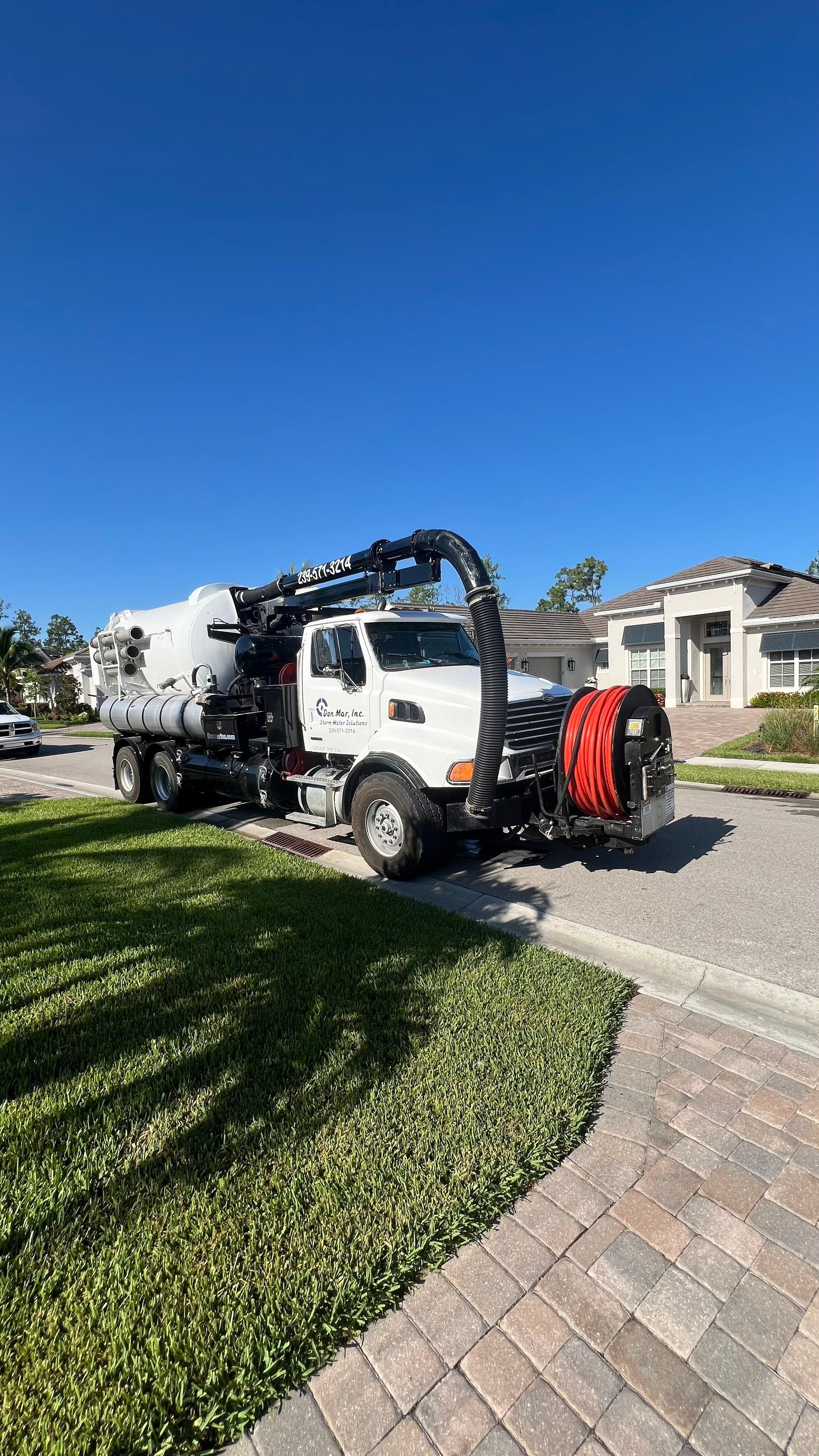 North Naples Community Stormwater Catch Basin Cleaning by APS Power & Water