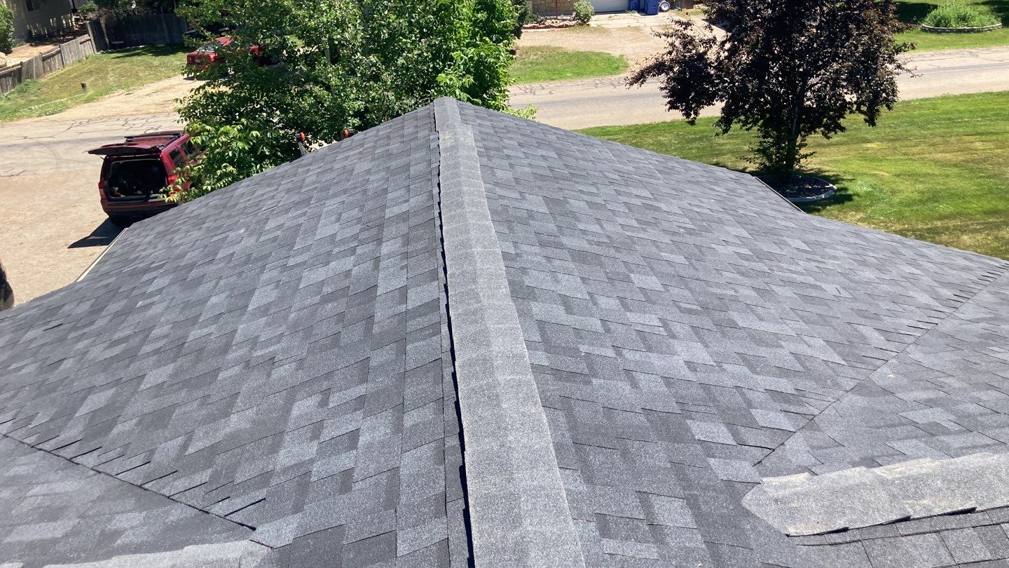 Breaking News!  Happy Homeowner gets a fantastic new roof by ID Roofing LLC