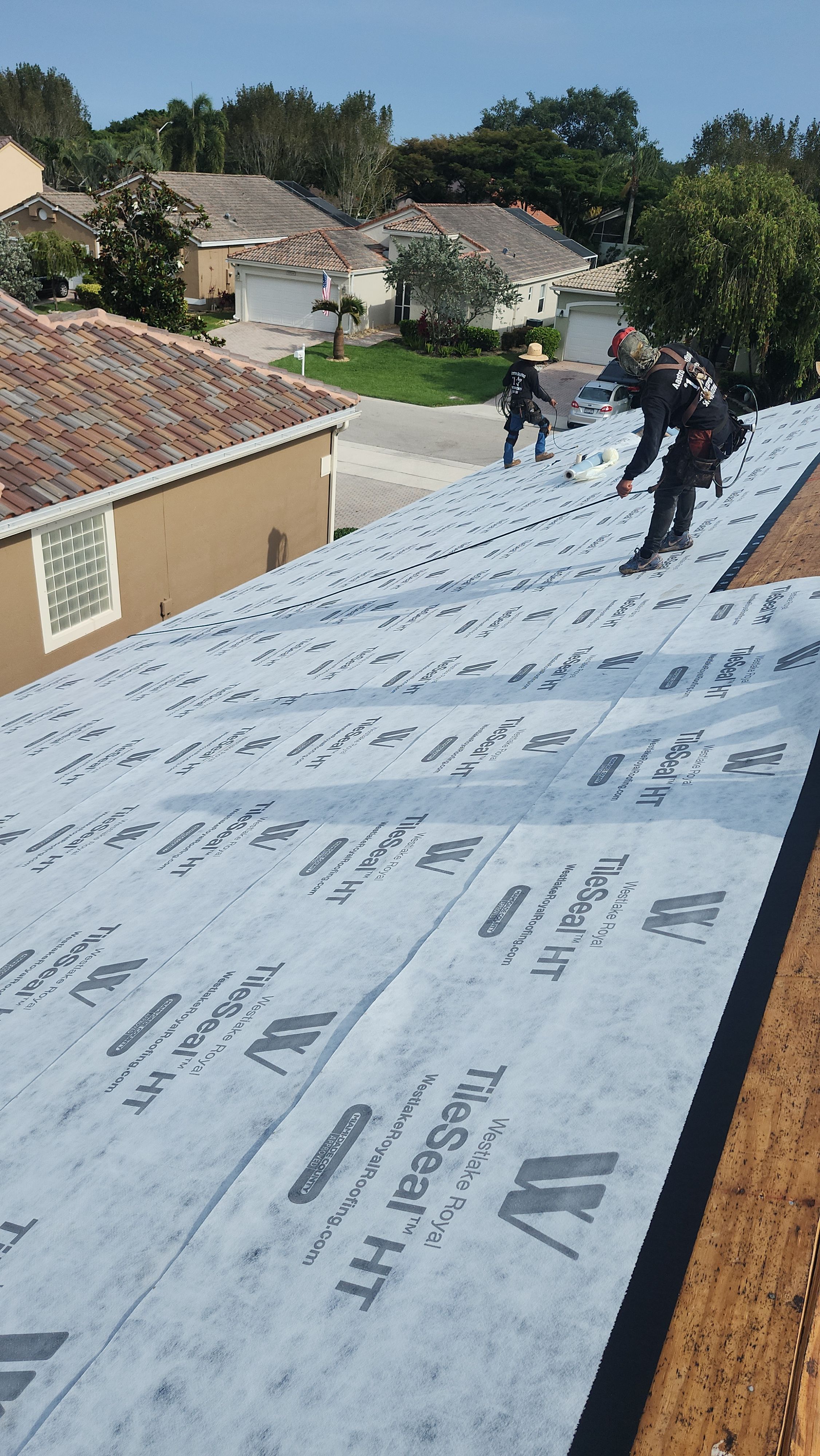 New Barrel Tile Roof Installation and Decking Repair in Boynton Beach by Aastro Roofing