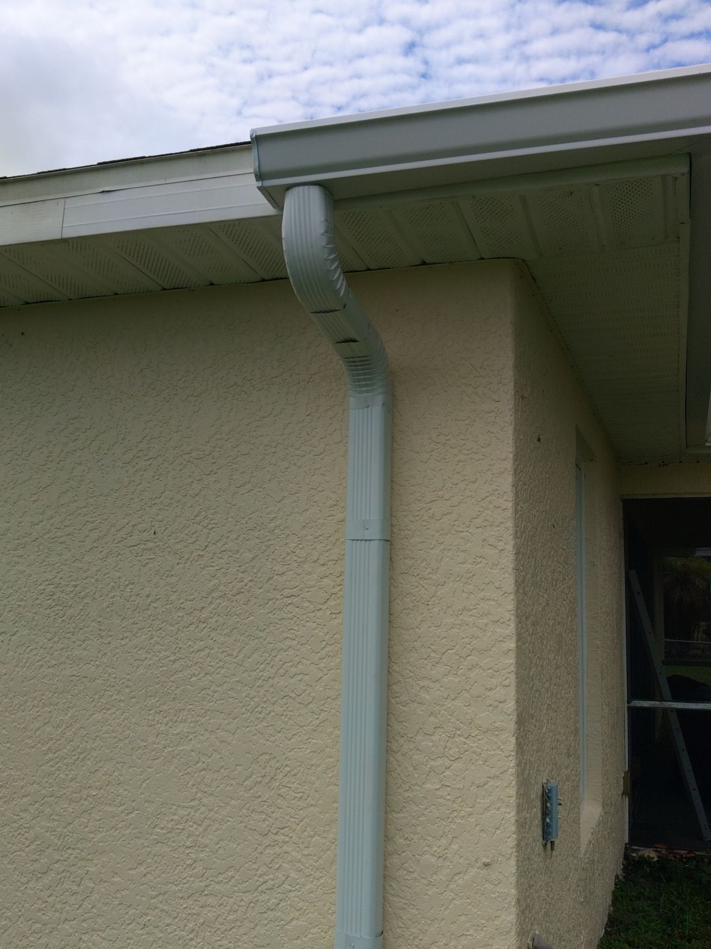 Seamless gutters in Lehigh Acres, FL provide a strong and efficient solution for managing heavy Florida rainfall by Gutter Professors
