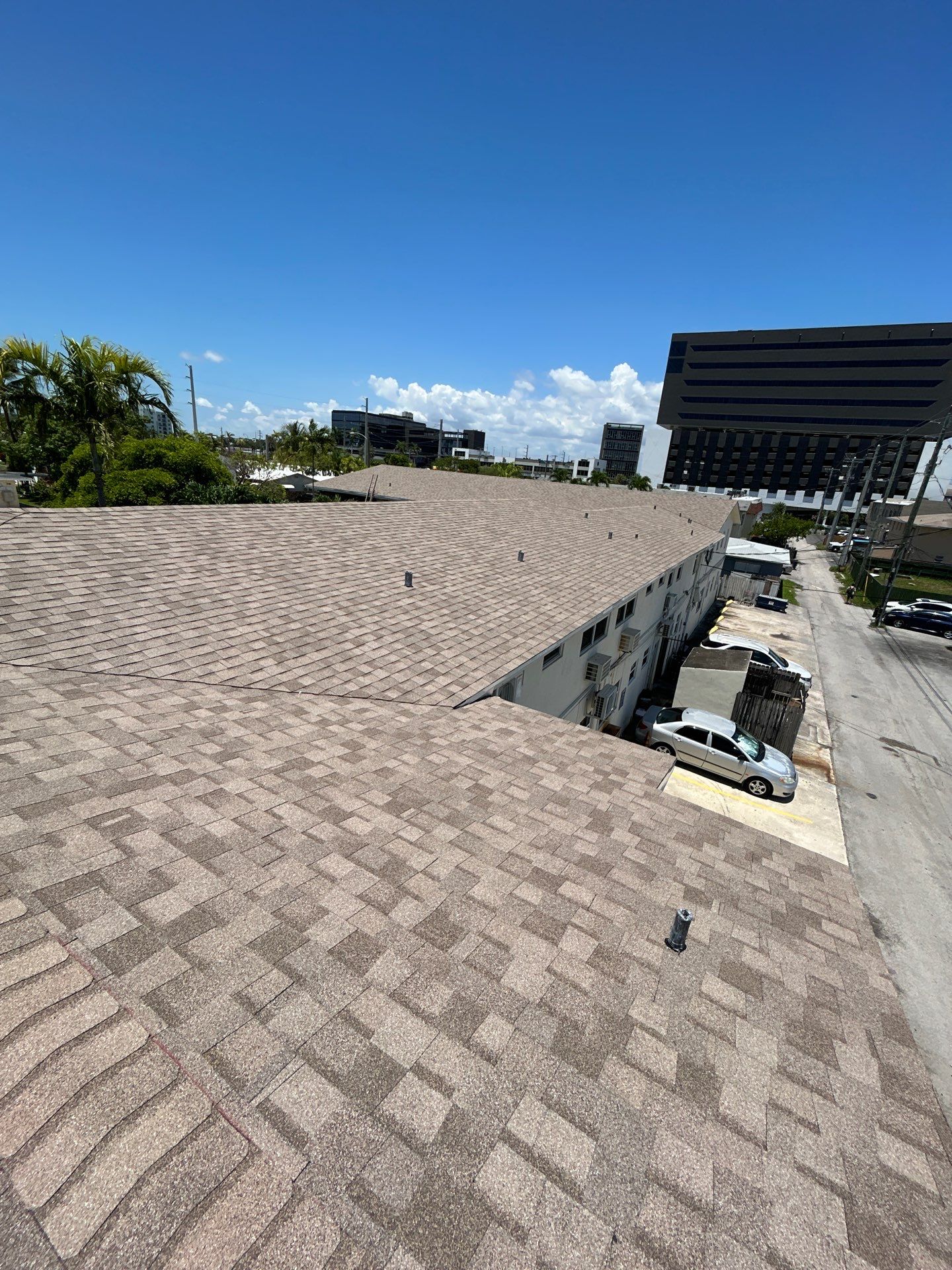 Commercial Roofing Installation using CERTAINTEED LANDMARK AR (SUNRISE CEDAR) by Earl W. Johnston Roofing 