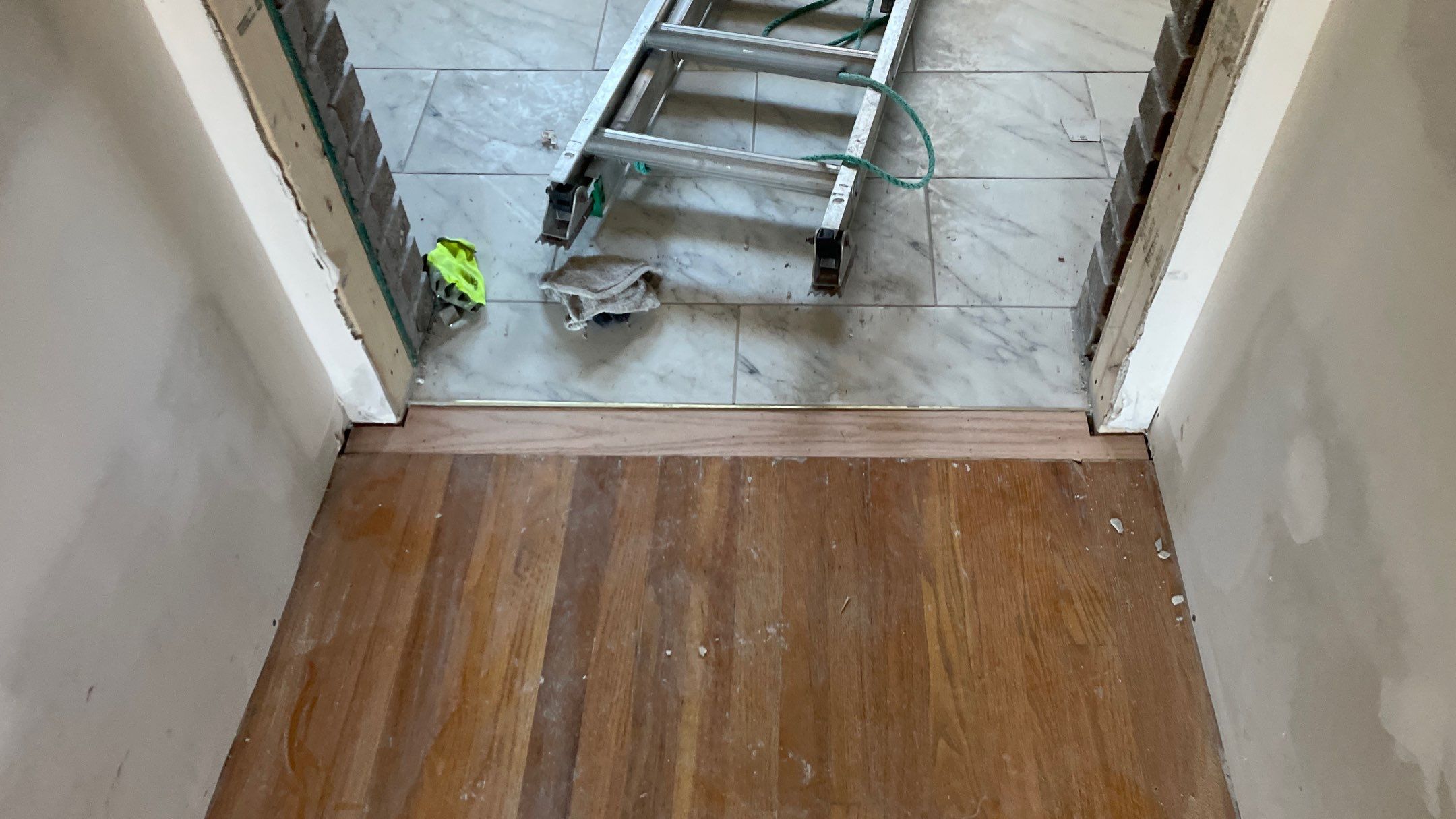 Remodeled Home with new tile floors, Showers and Refinished Oak Floors with stain and Waterbased Finish by Footprints Floors of Coastal Carolina