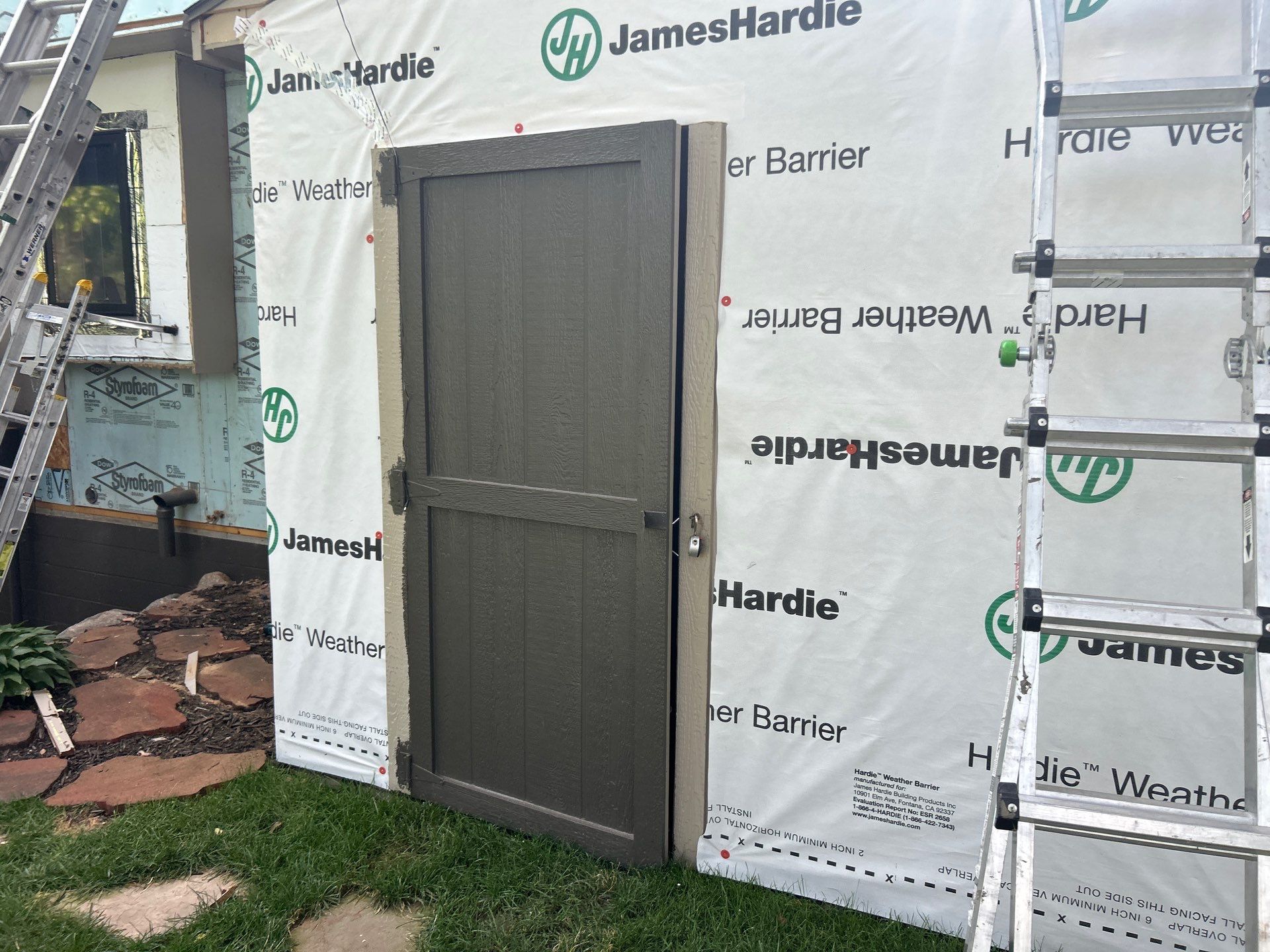 Marvin Window Replacement and Rich Espresso Hardie Siding Installation in Omaha by Carps Complete Exteriors