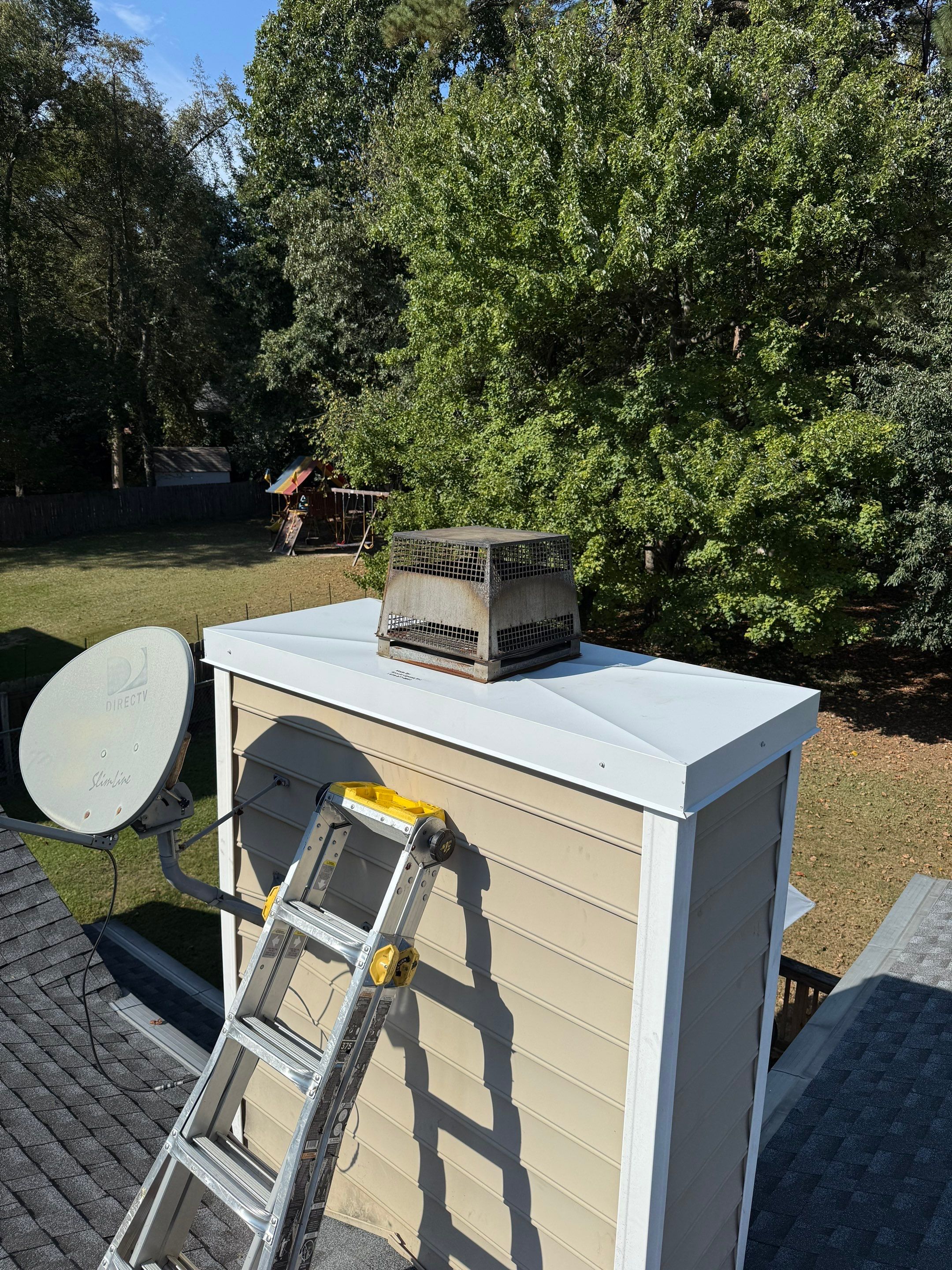 Roof Replacement - Timberline HDZ Pewter Gray - Chimney Cap by Pro Performance Roofing