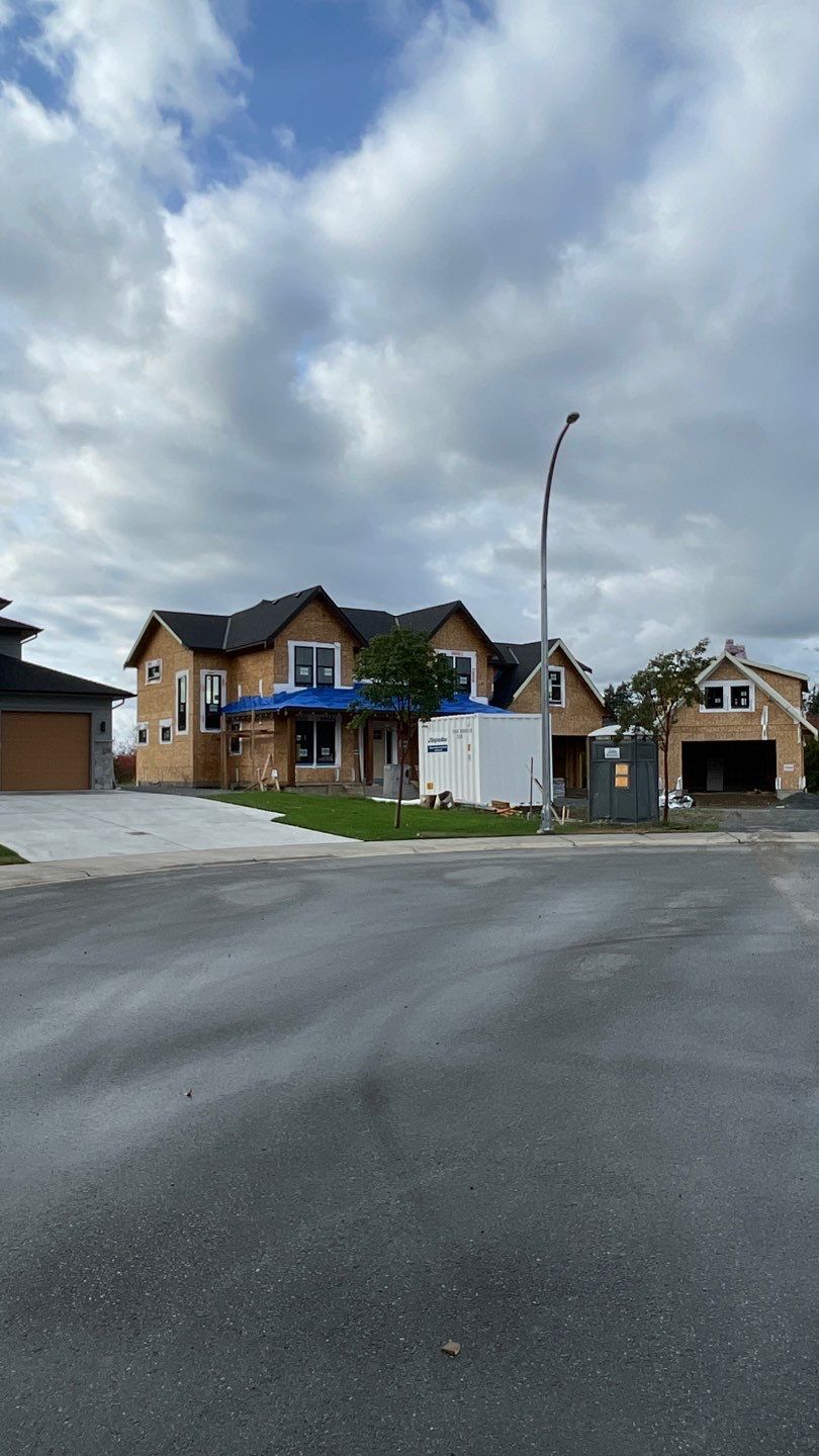 Residential Roofing Installation using OC Oakridge shingles with prolok accent roofs by Top Notch Roofing Inc