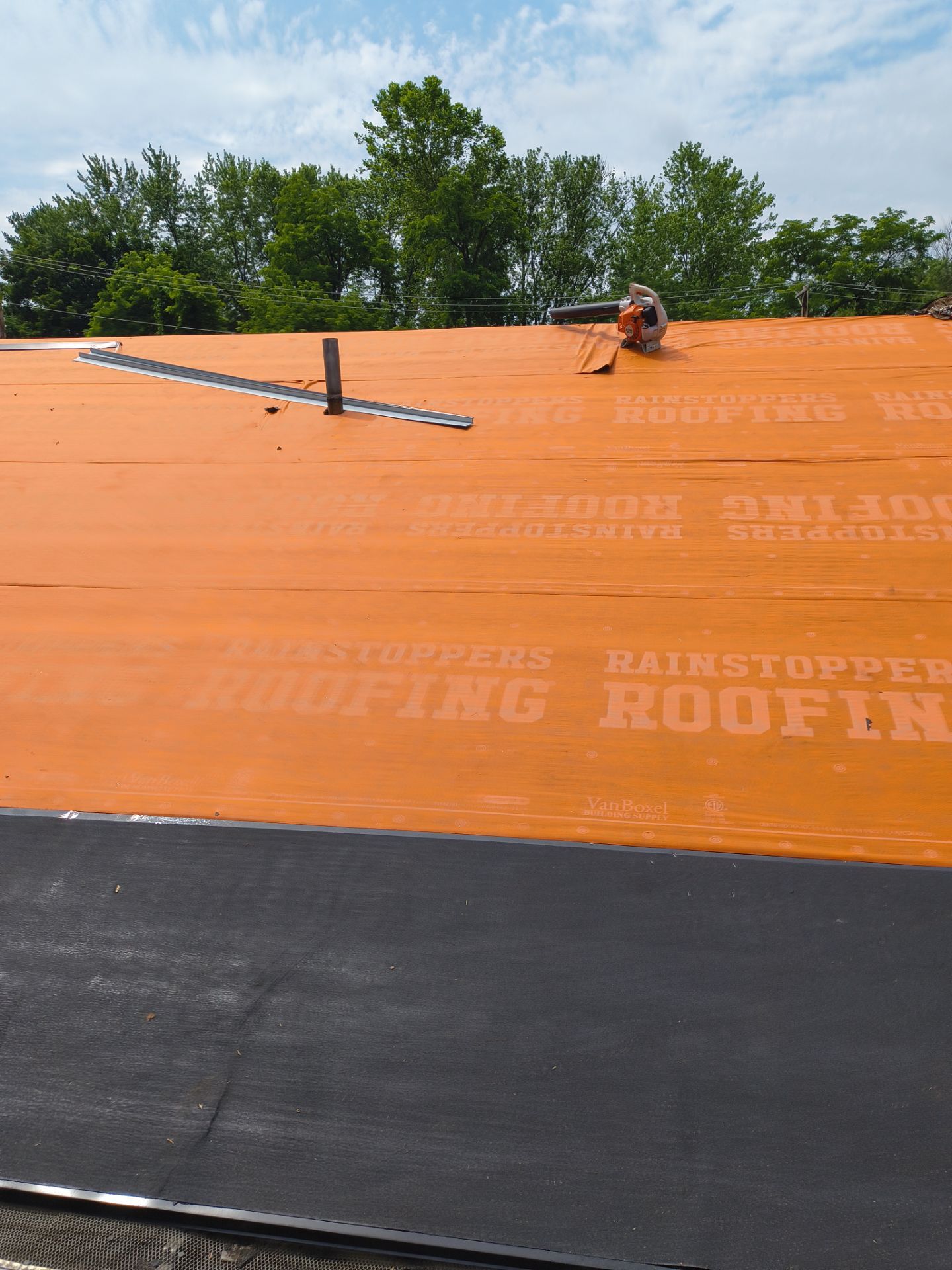 Residential Roofing Installation using GAF Timberline HDZ Oyster Grey by Rainstoppers Roofing