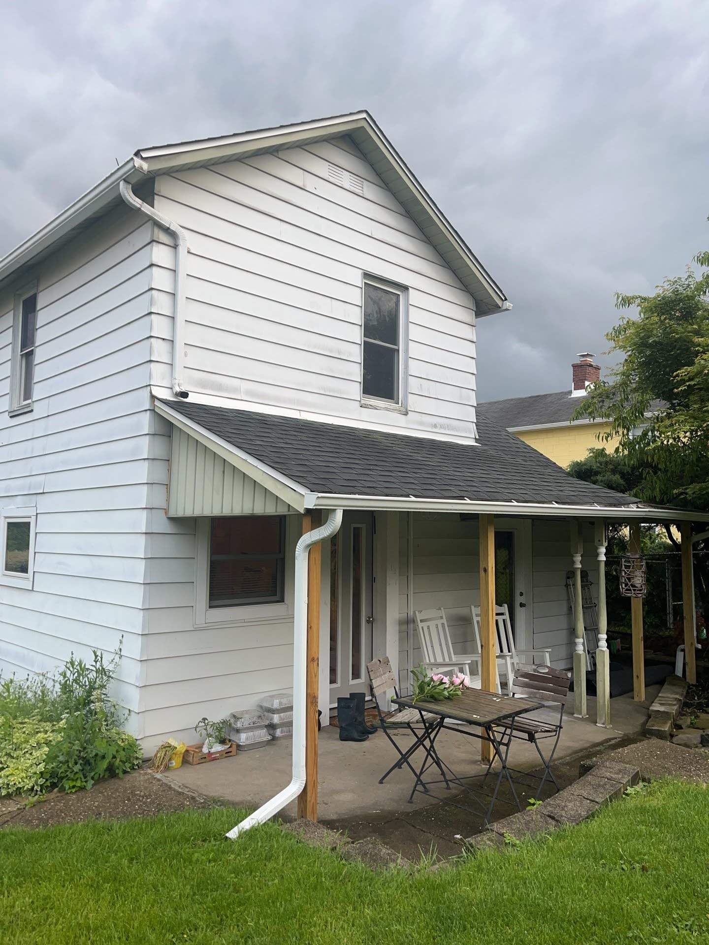 House Siding Renovation with White Vinyl in Bridgeville by Ideal Siding Pittsburgh