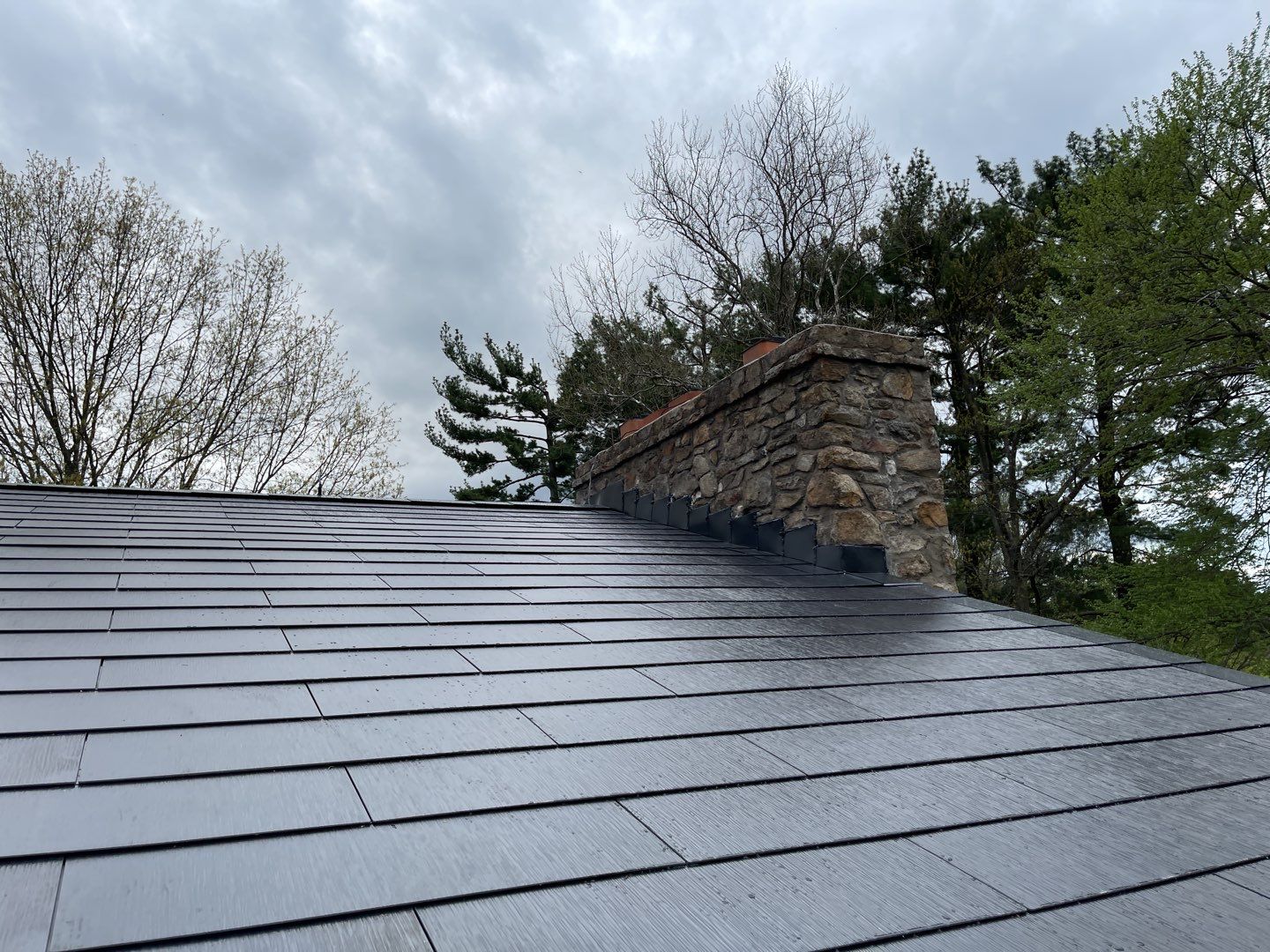 Tesla Solar Roof Replacement by American Home Contractors