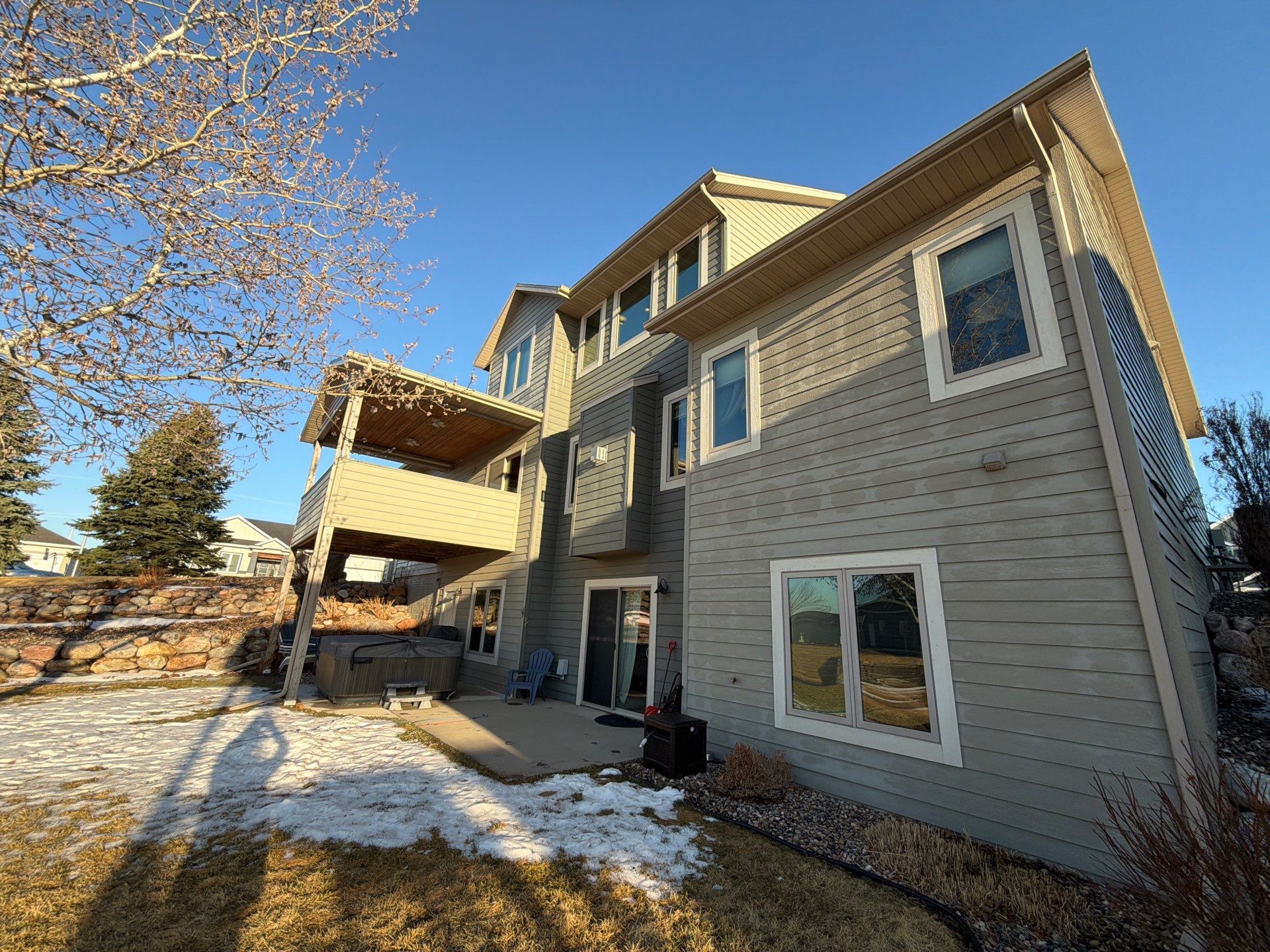 Residential Exterior Painting and Color Update in Sioux Falls by Select Painting, Coatings & Garage Cabinets