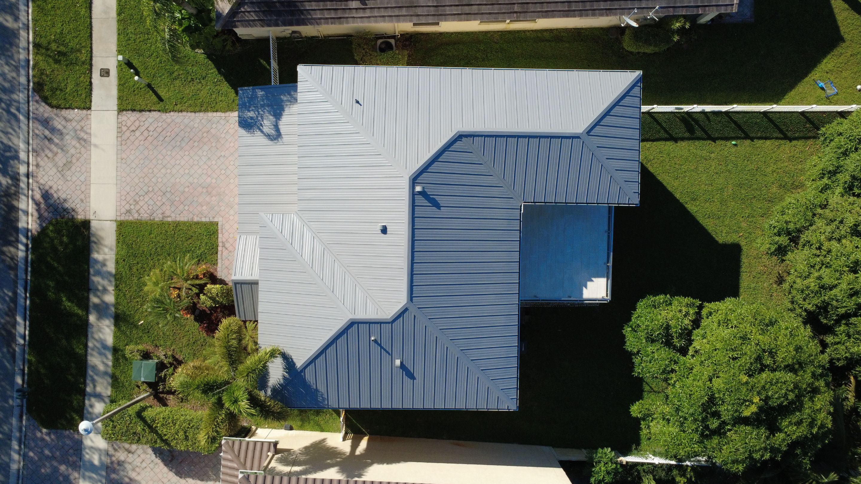 Residential Roofing Installation using 1" Nail strip metal roof by BLUES BROTHERS ROOFING