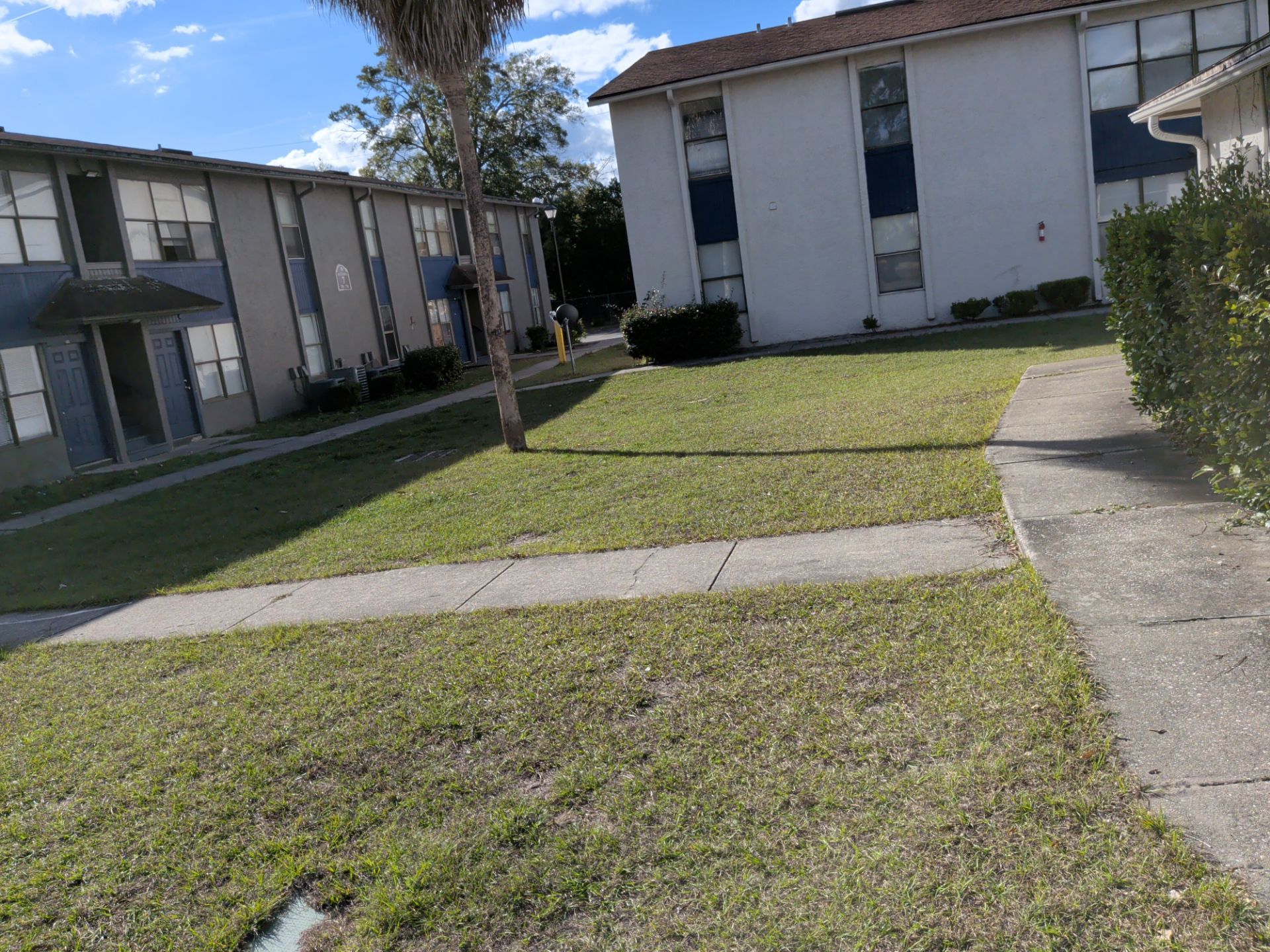 Commercial Landscape Cleanup & Weekly Maintenance — Grassy Pond Apartments by Harmoni Home Services