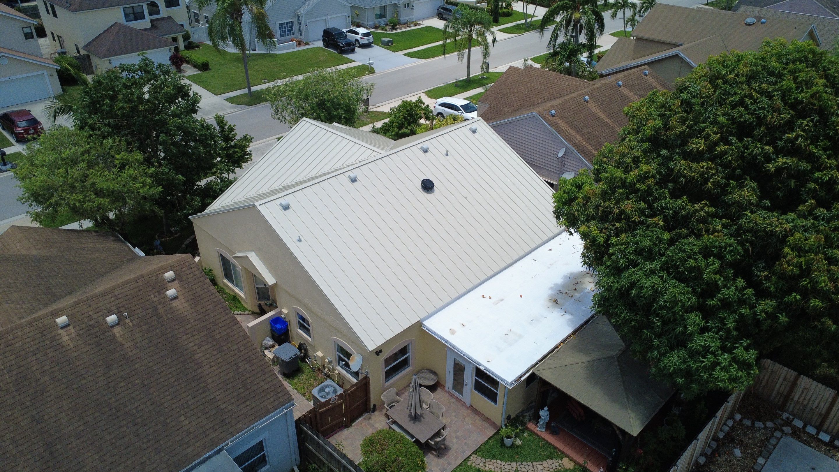 Residential Roofing Installation using 1.5'' Mechanical Seam by BLUES BROTHERS ROOFING