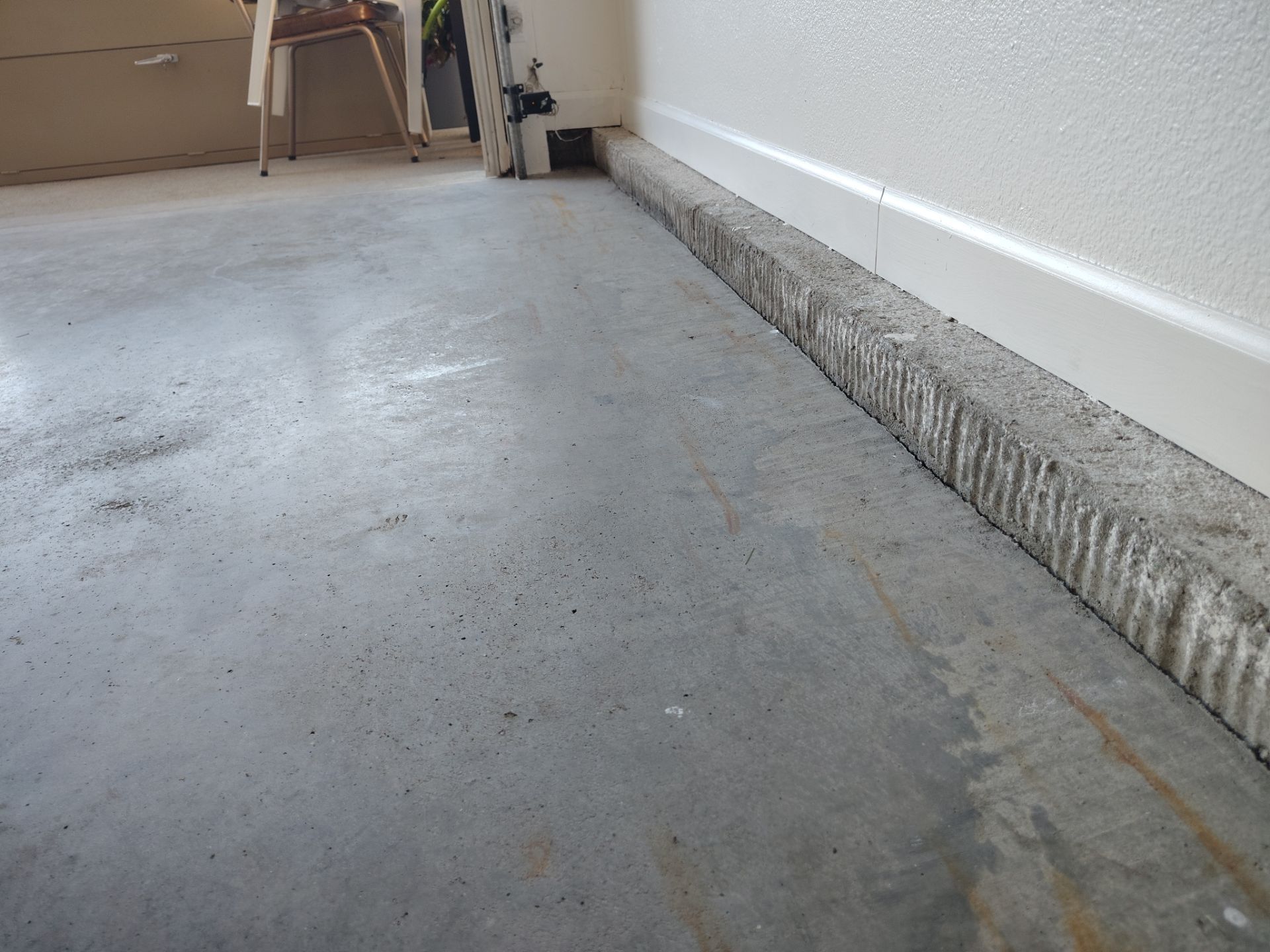 New Johnston Garage Resurfacing by Revival Concrete Coatings, LLC