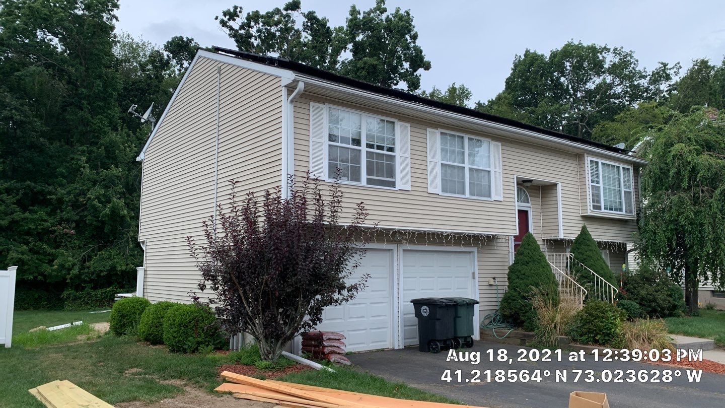 Siding Repair using Certainteed Mainsteet D4 and EPDM roof under deck by A Plus Exterior