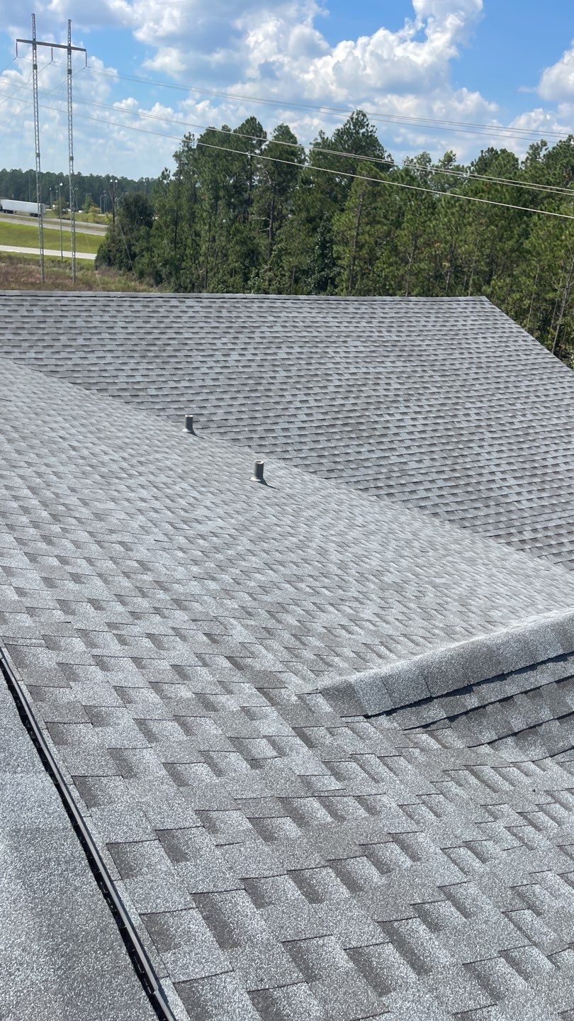 Commercial Roofing Installation using Roof Replacement by American Roofing & Construction LLC