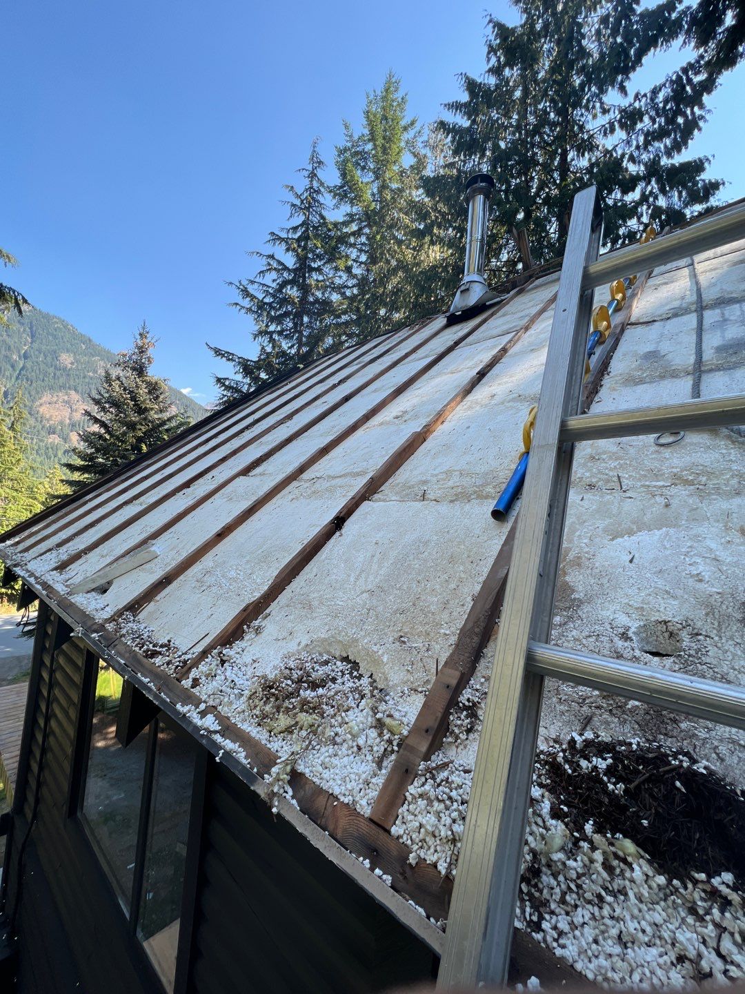 Residential ReRoofing Installation using 12" Prolok metal  by Top Notch Roofing Inc