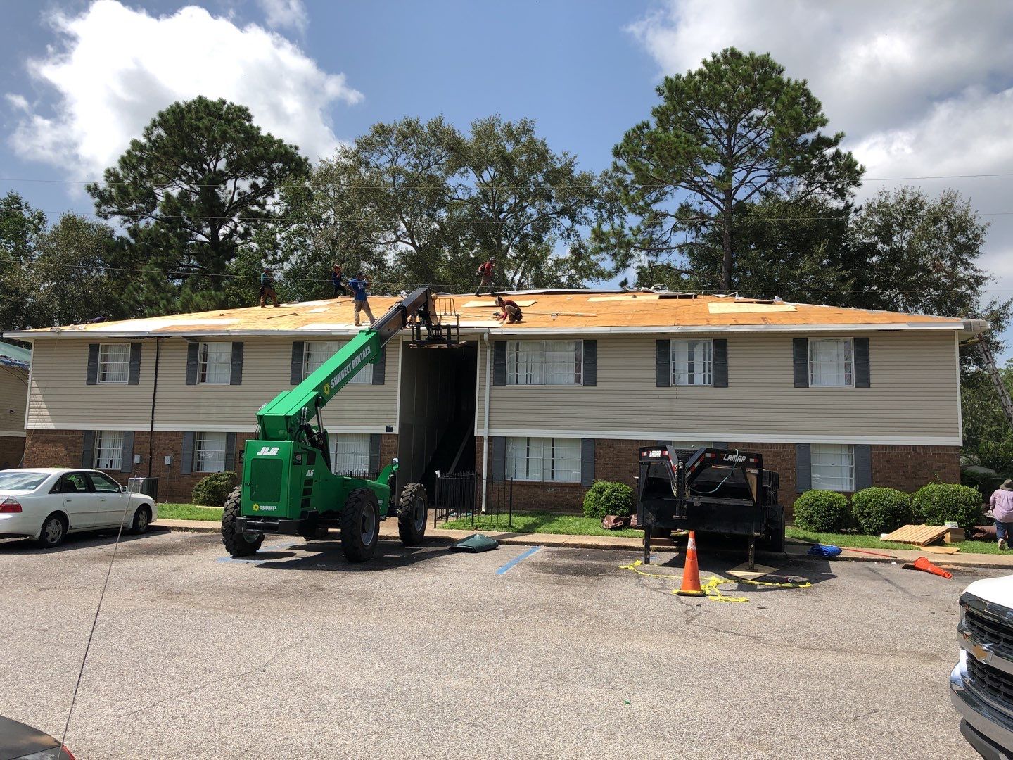 Commercial Roofing Installation using Roof Replacement by American Roofing & Construction LLC