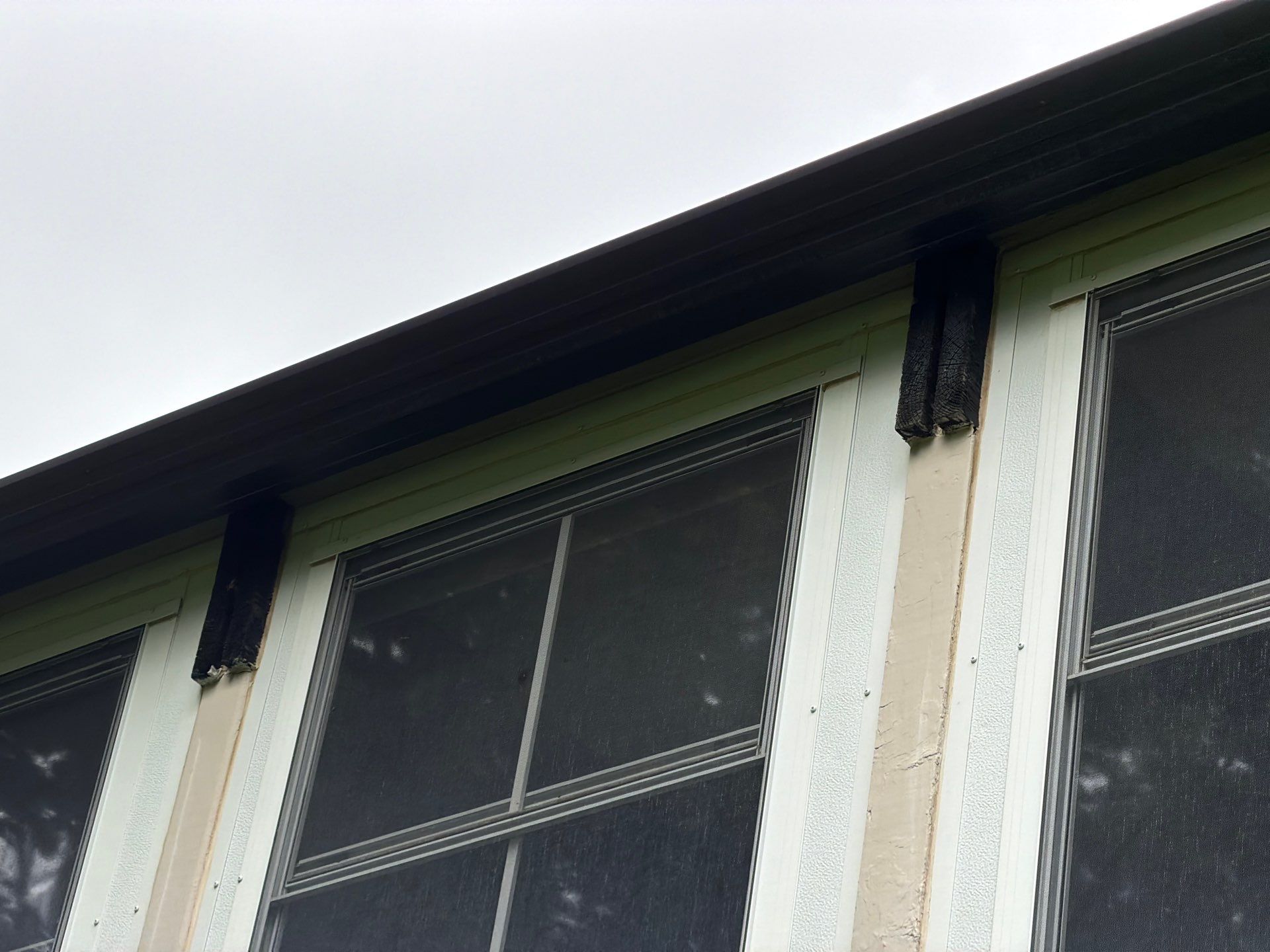 Exterior Trim Painting and Rafter Staining in Sioux Falls by Select Painting, Coatings & Garage Cabinets