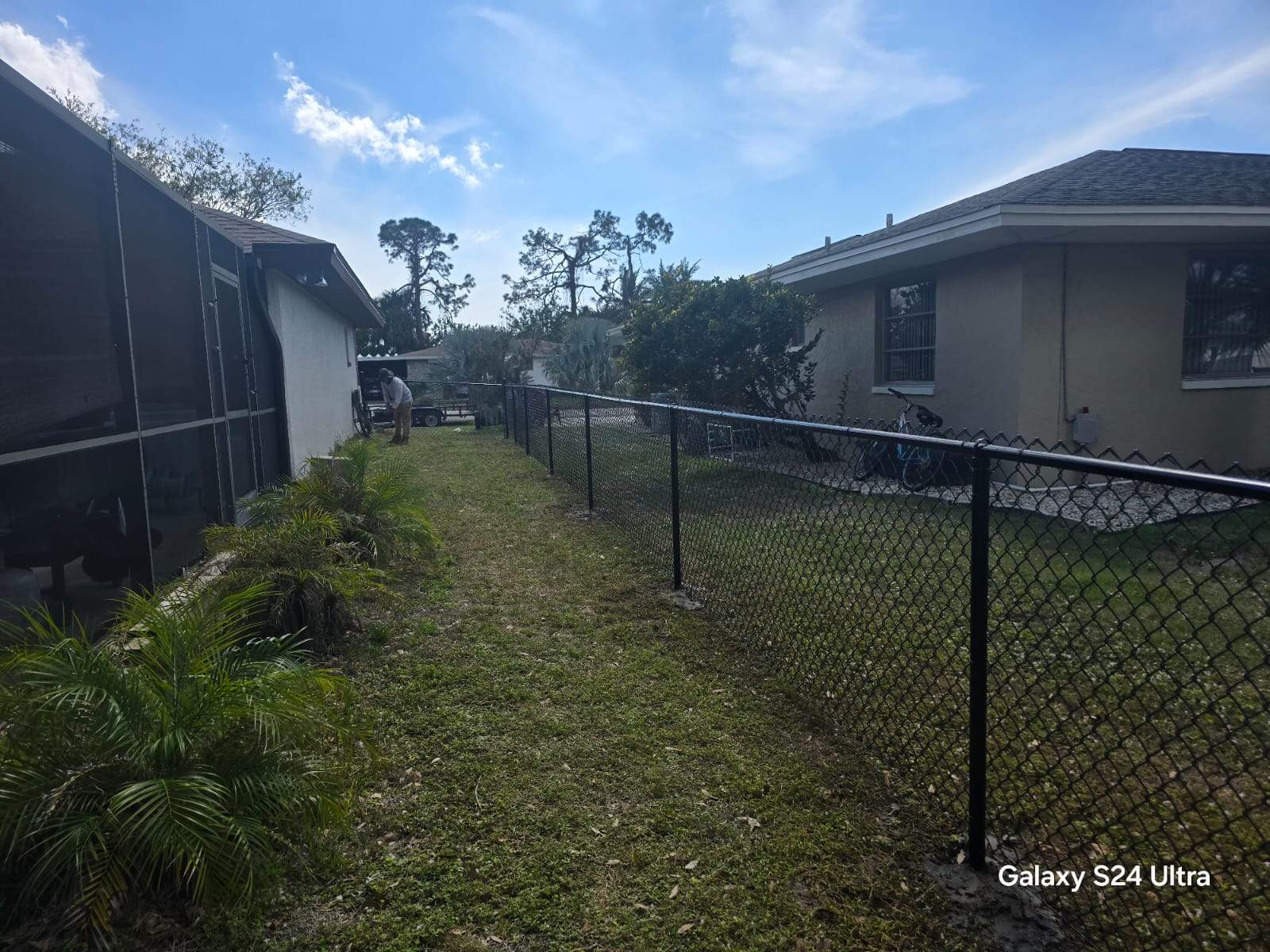 Black Chain Link Fence Installation for Port Charlotte Residence by True Fence LLC