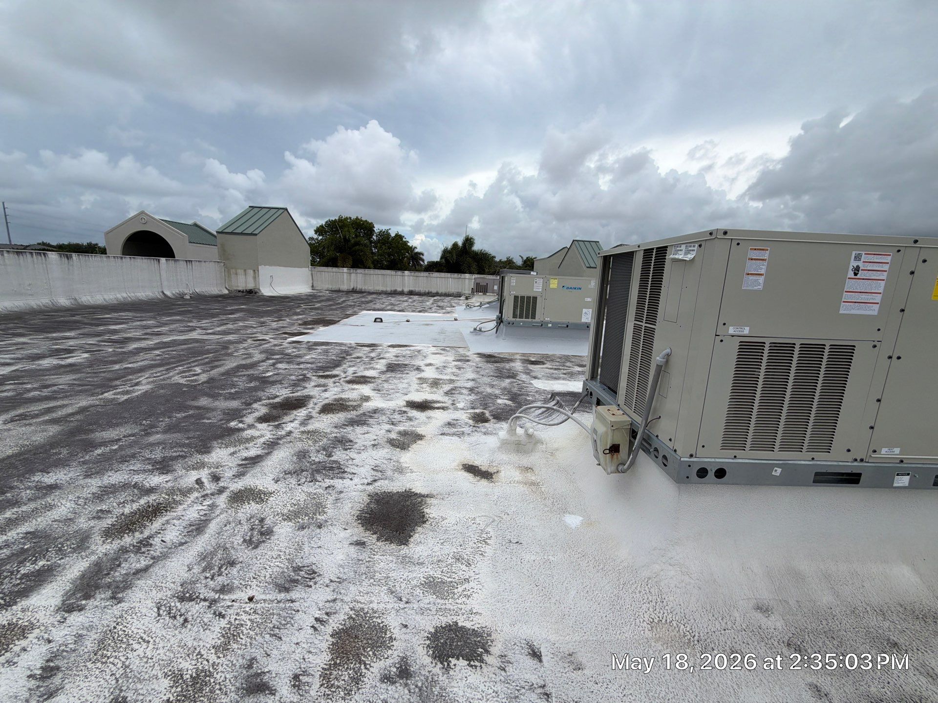 Commercial Flat Roof Restoration and Elastomeric Waterproofing in Delray Beach by Roof King LLC