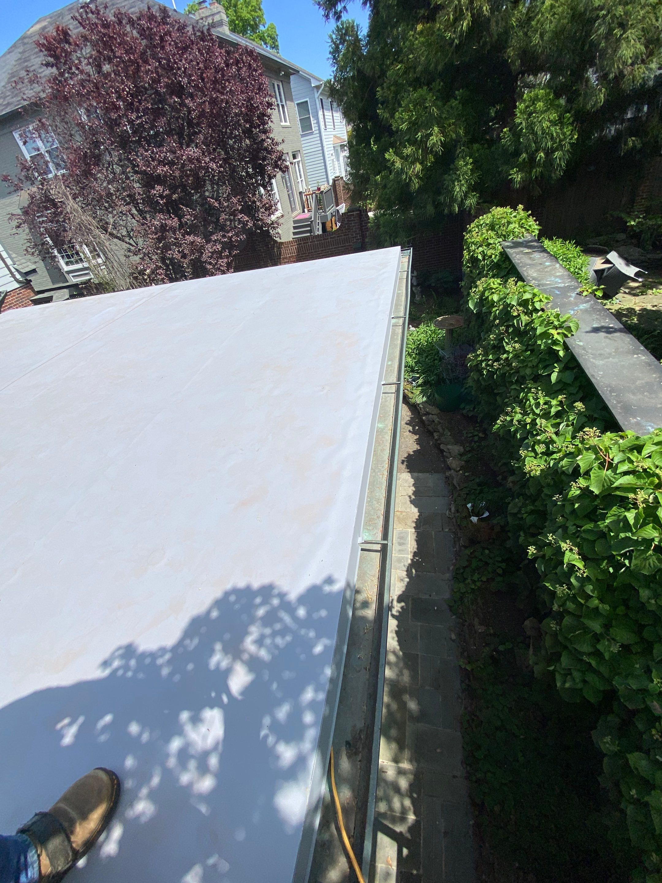 Arlington: Buckingham Slate and Carlisle Syntec TPO Roof by RM Banning, Inc.