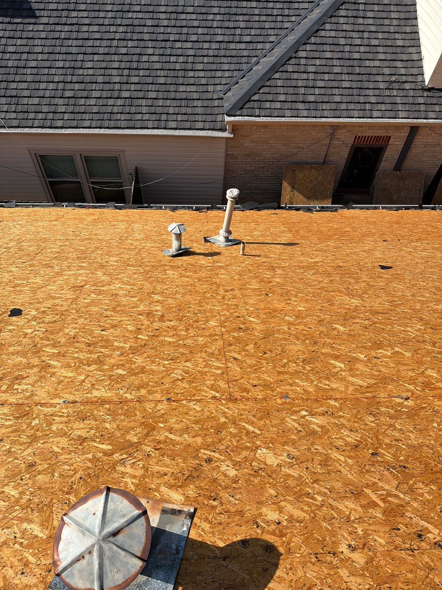 Residential Roof Replacement Featuring New OSB Sheathing in Wichita Falls by Shearman Roofing & Construction