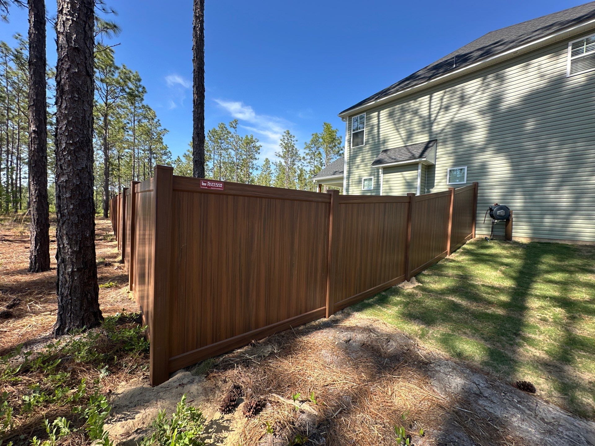 Custom Vinyl Privacy and Aluminum Fence Installation in Fayetteville by Superior Fence and Rail