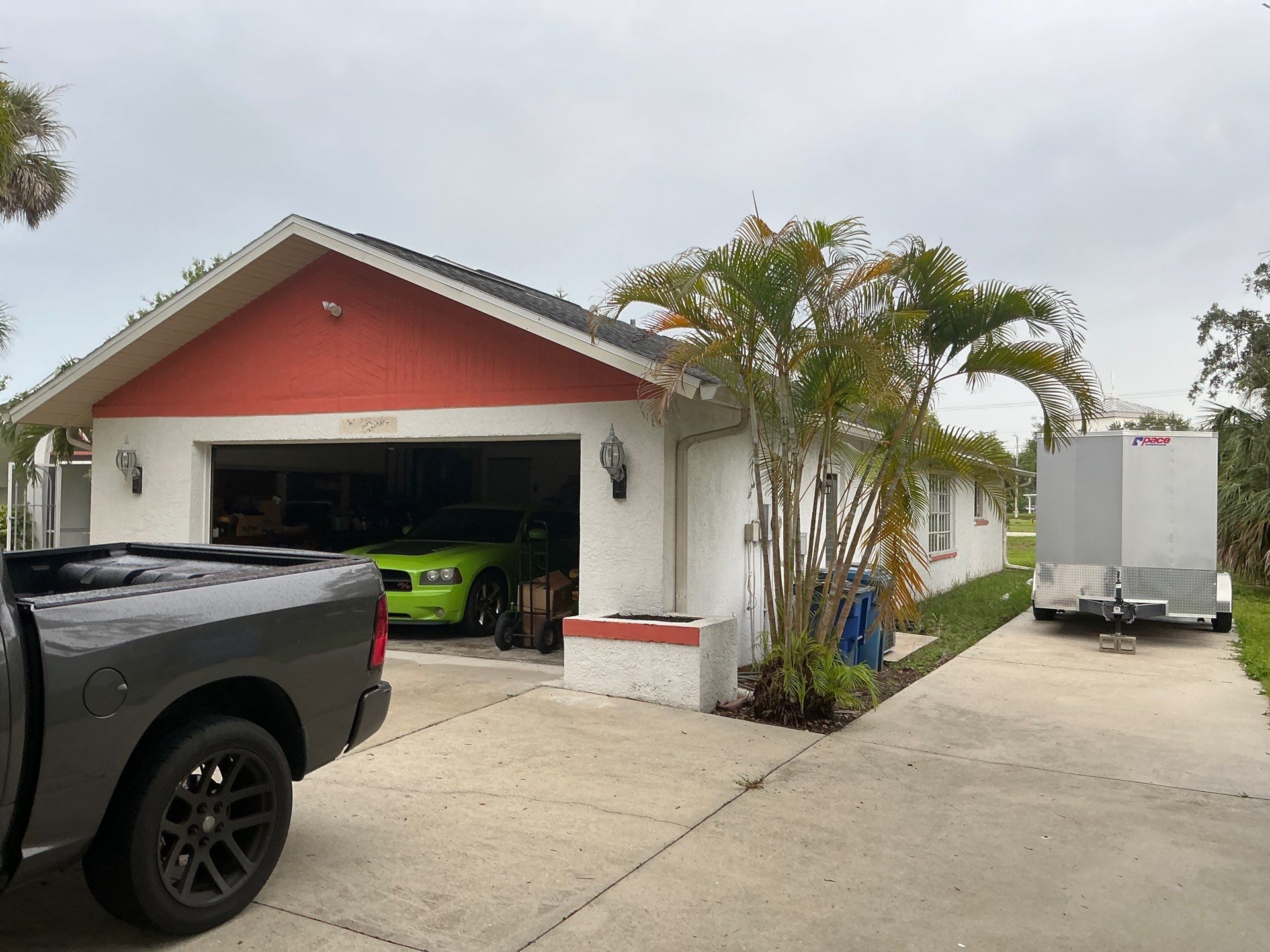 White Seamless Gutters with Splash Guards in North Fort Myers FL by Gutter Professor   by Gutter Professors