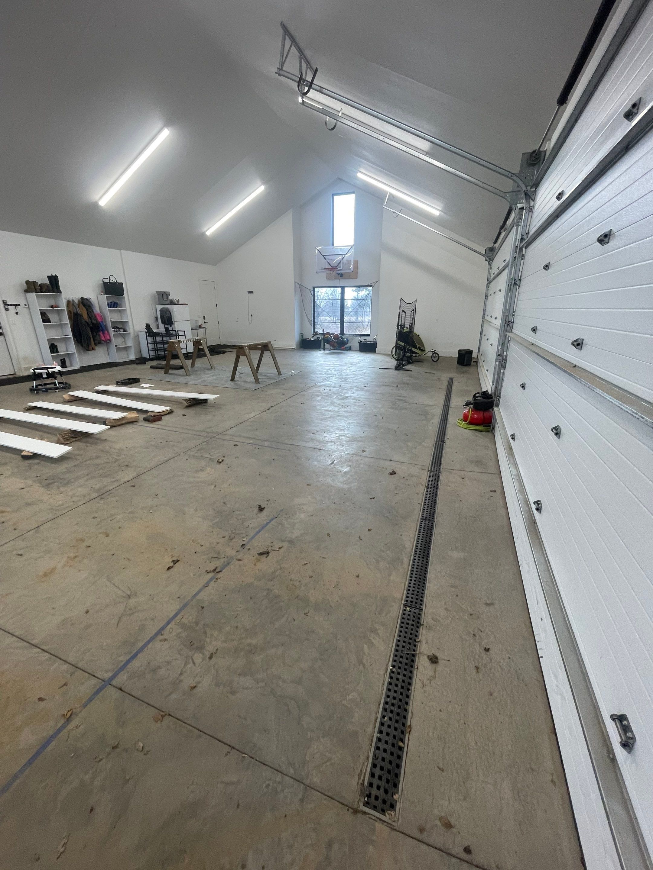 Epoxy Flake Garage Floor and Stair Coating in Sioux Falls by Select Painting, Coatings & Garage Cabinets