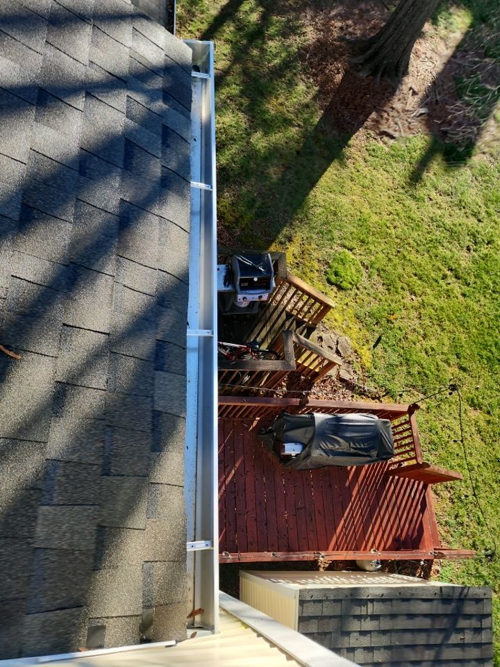 Gutter Cleaning using water by Power Wash Masters LLC