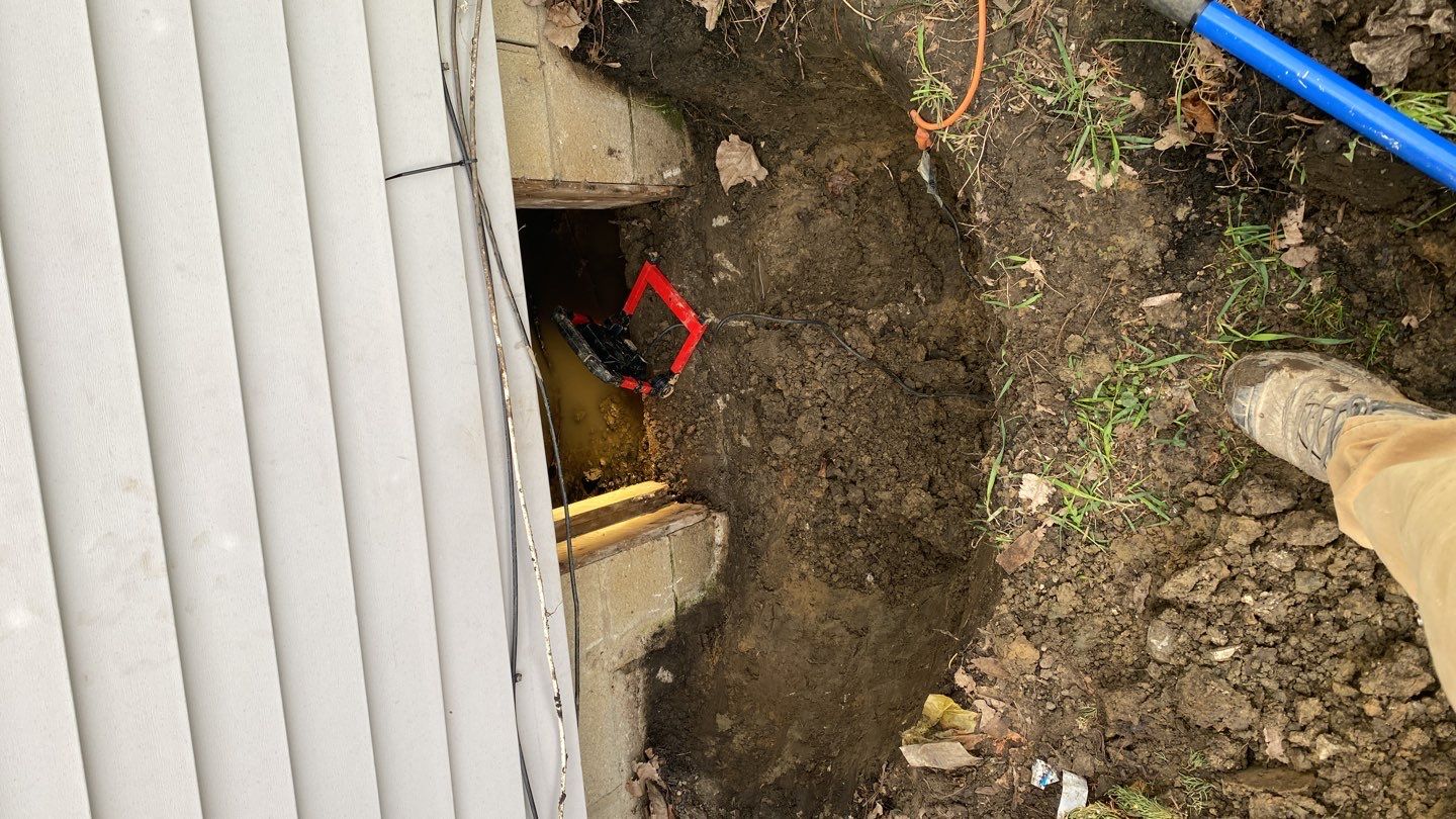Crawl space encapsulation and Waterproofing using GrateDrain Waterproofing System by Toledo Basement Repair 
