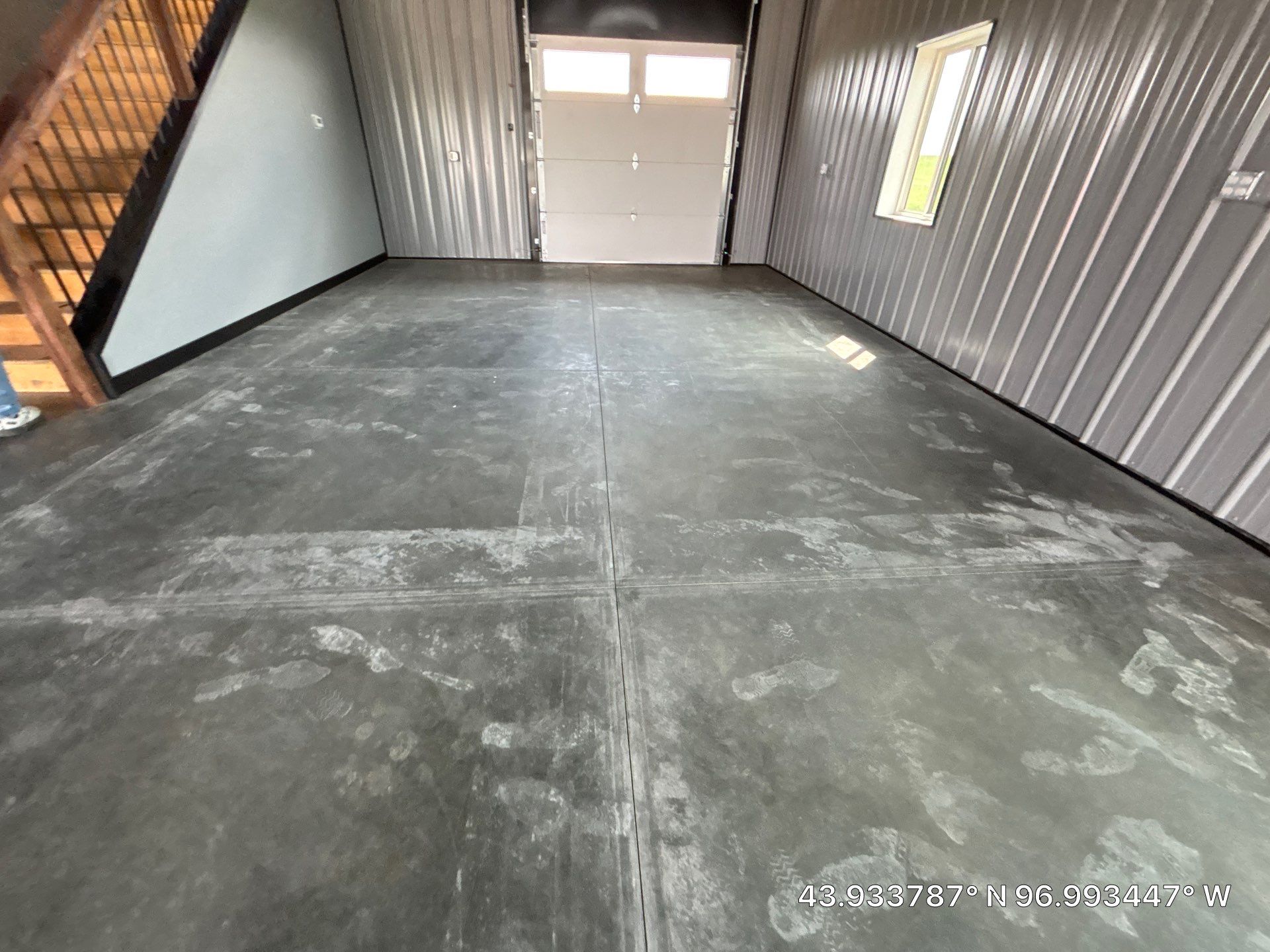 Polyaspartic Garage Floor Coating with Decorative Flake in Wentworth by Select Painting, Coatings & Garage Cabinets