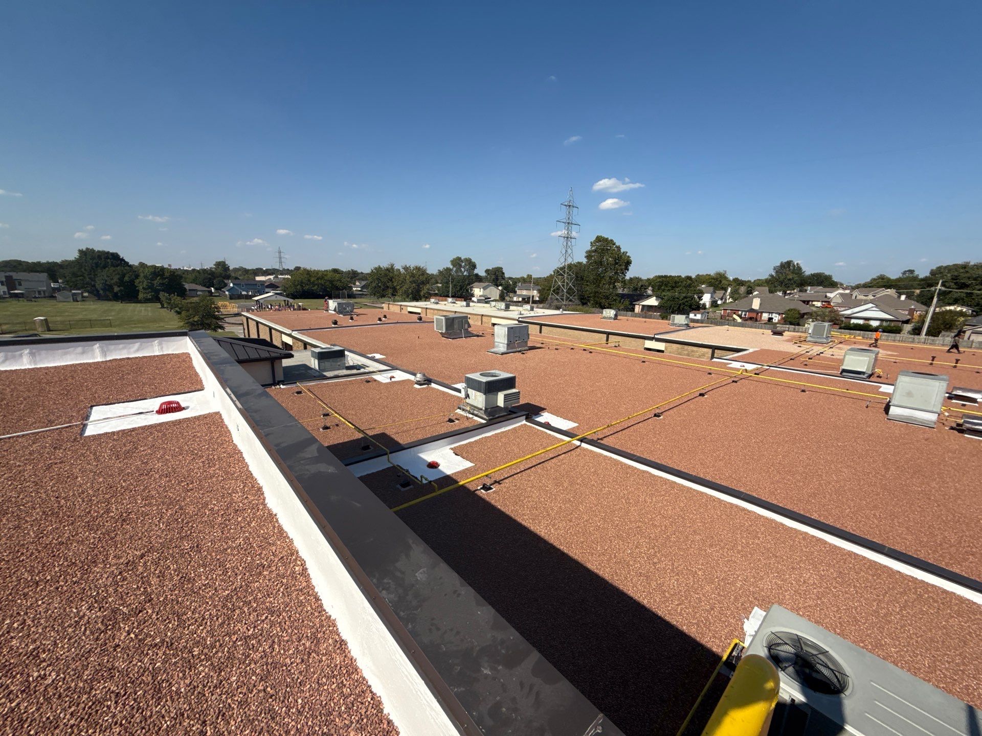 Mills Elementary School Commercial Re-Roof and Moisture Protection by Secondary Rhodes