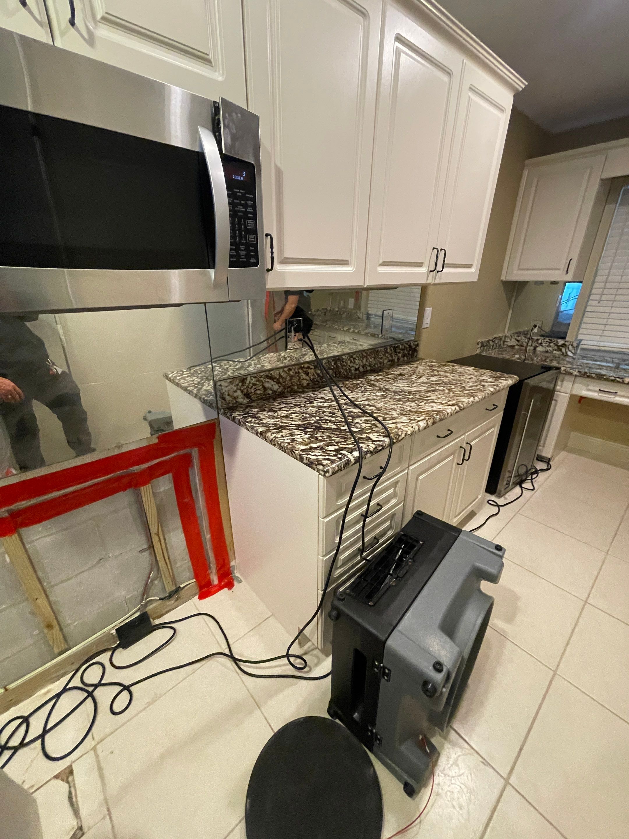 Mold remediation and rebuild of kitchen and living areas by Bay Coast Restoration 