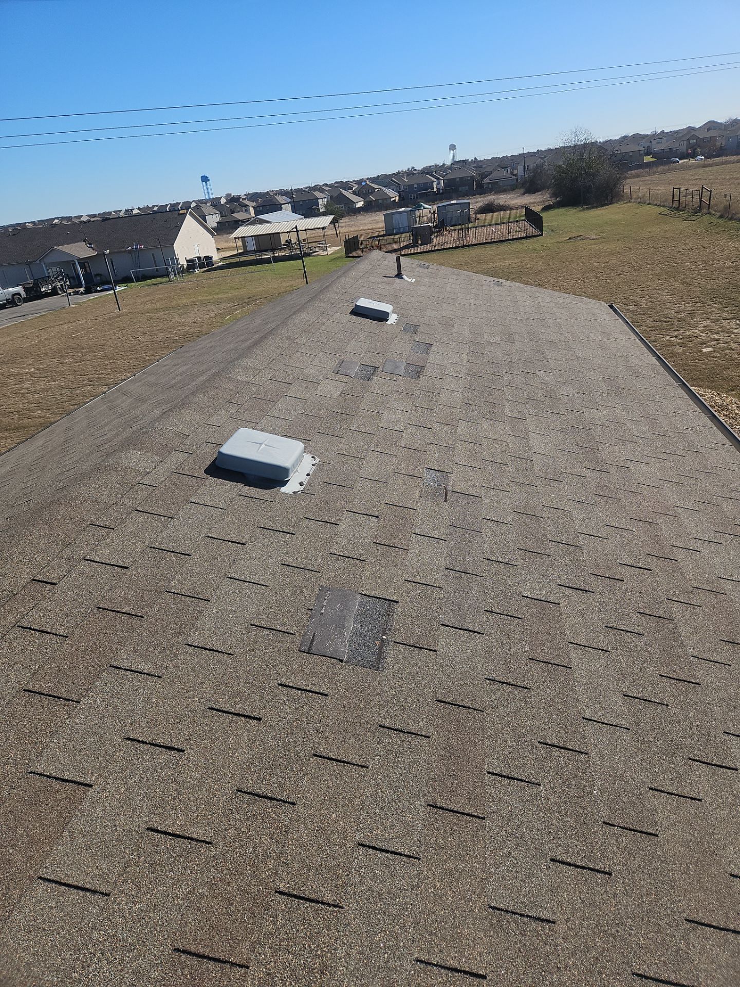 Commercial Roofing Installation using GAF - HDZ - Weathered Wood by Action Exteriors Austin