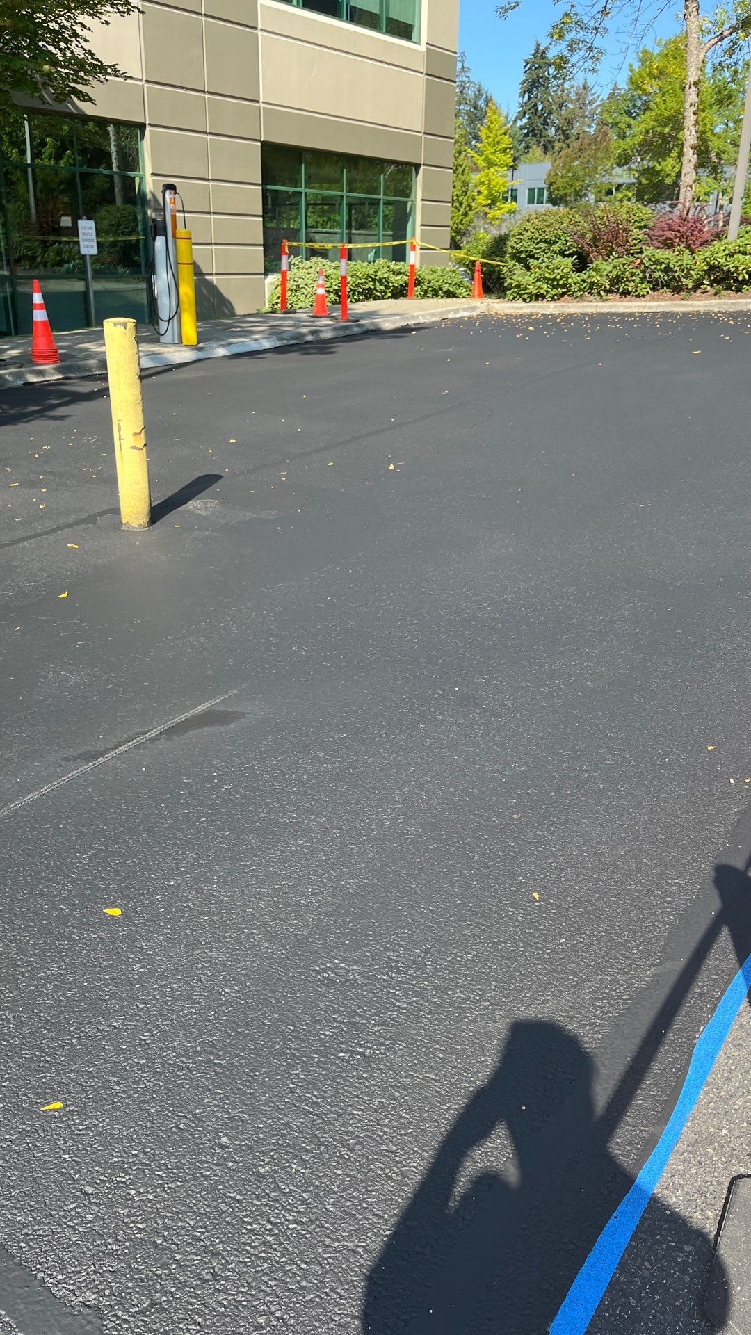 Kidder Matthews | Parking Lot Sealcoating & Striping with Concrete Curb & Patch Repairs  by Jireh Asphalt & Concrete Inc 