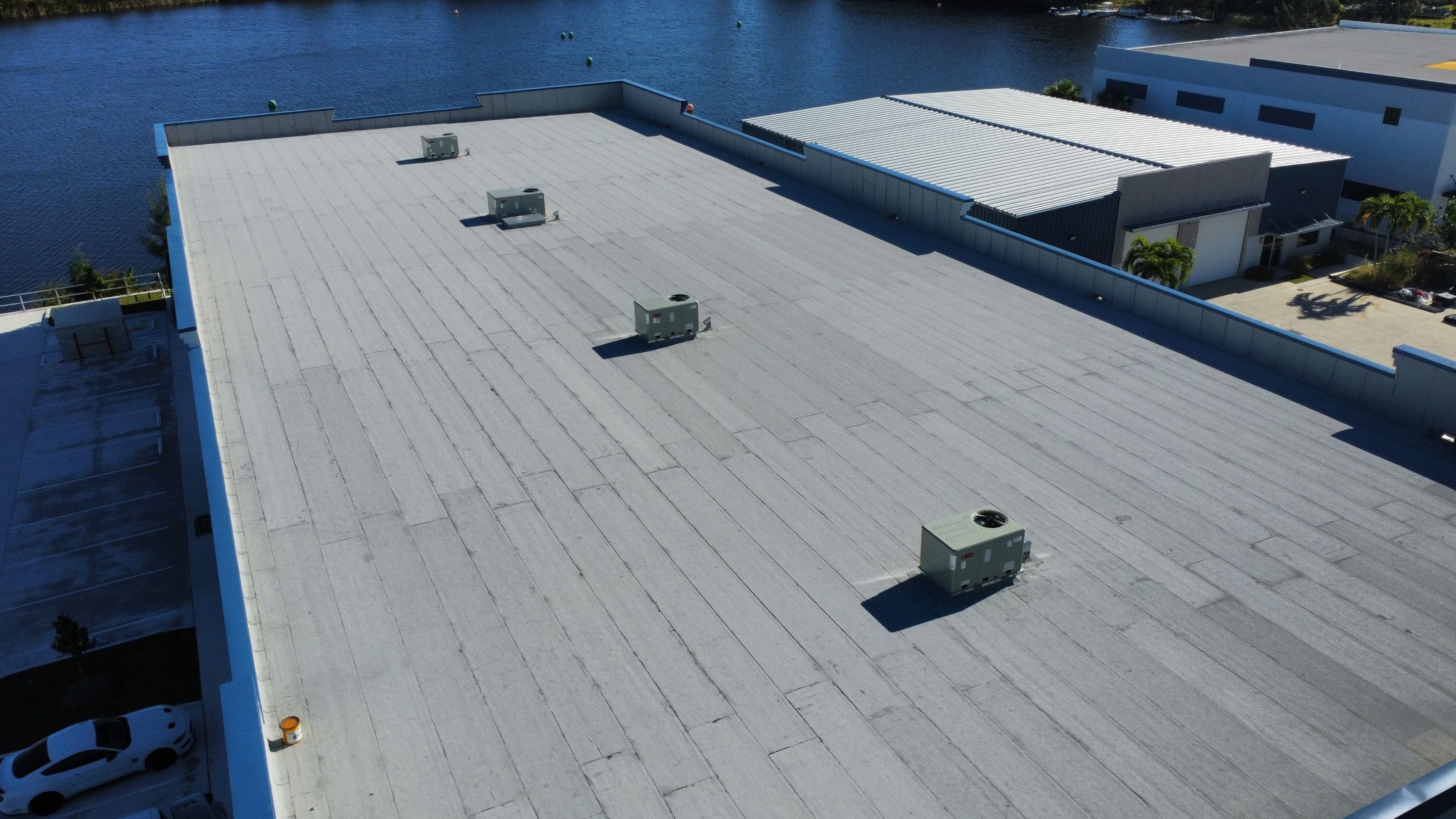 Torch Applied Modified Bitumen Roof Installation by Sailfish Roofing