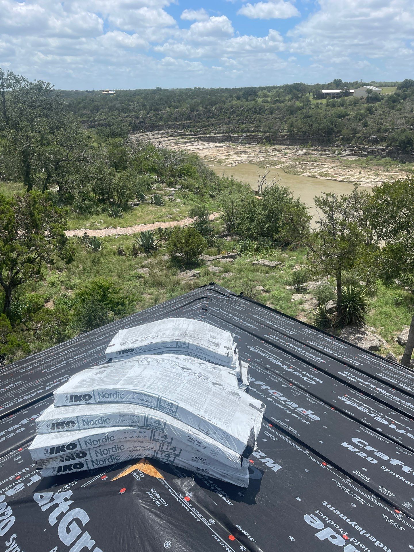 Residential Roofing Installation using IKO Nordic Granite Black by DeZign Roofing & Exteriors