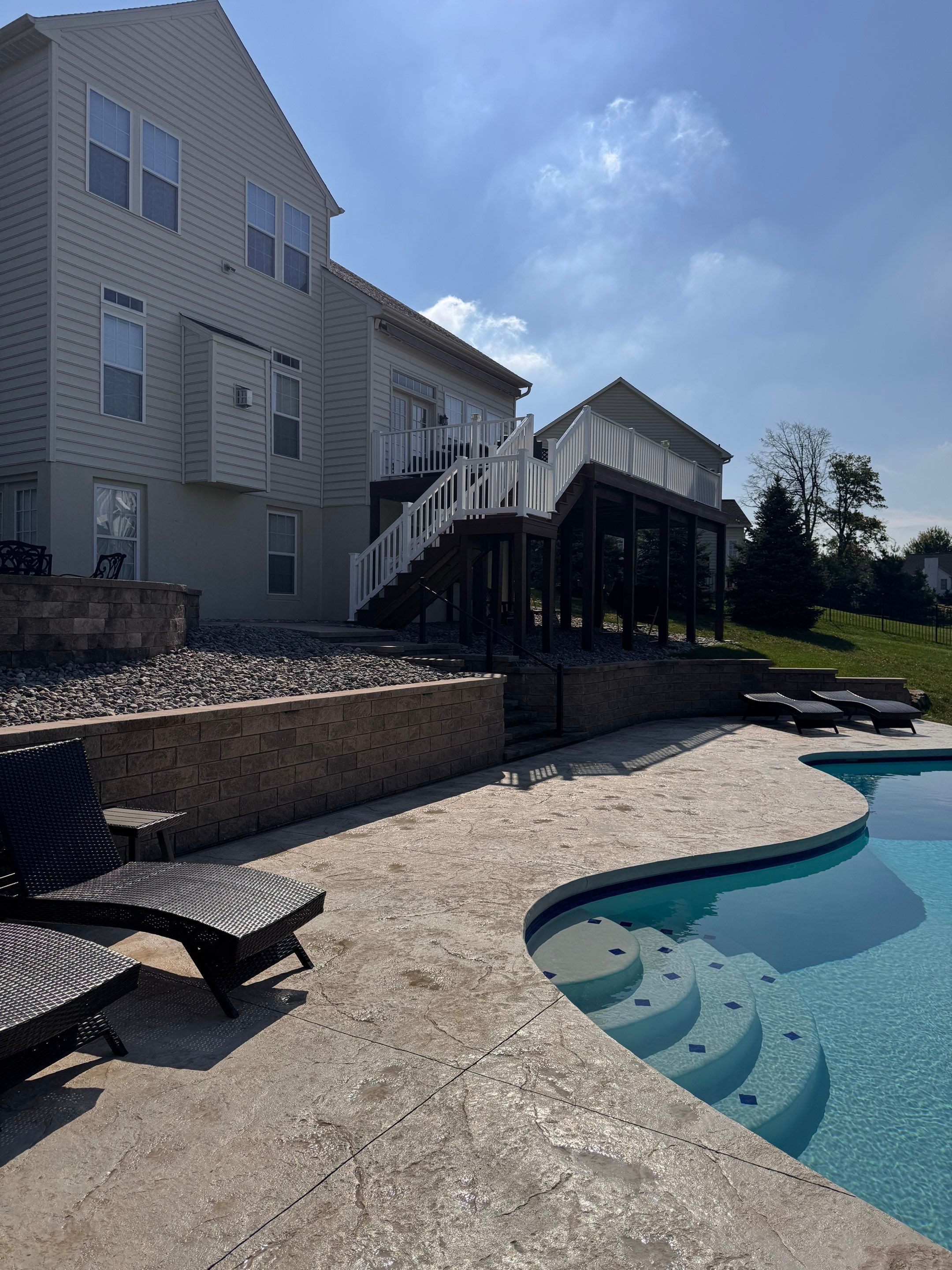 stamped concrete pool deck  by Architectural Concrete Design