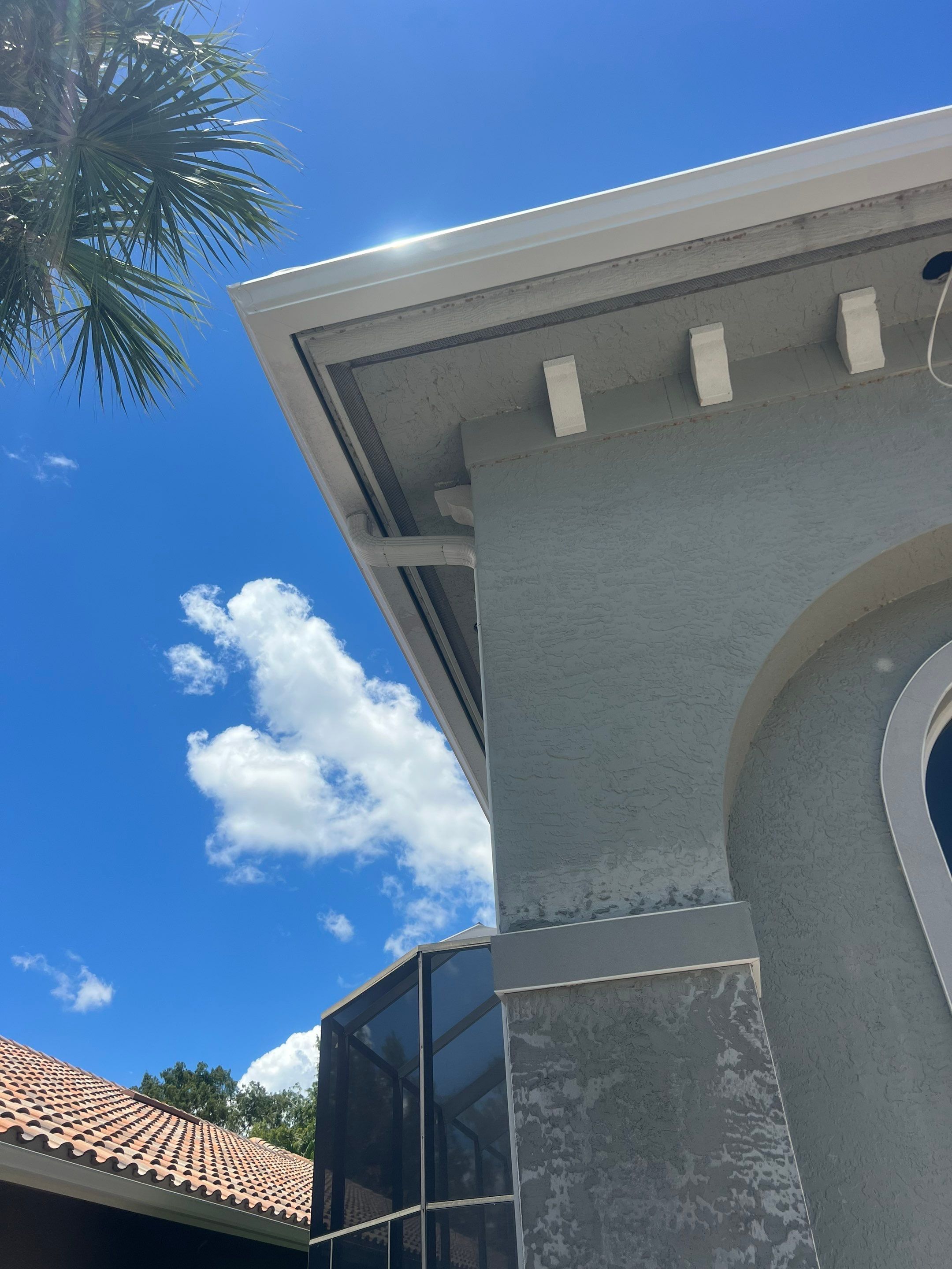 6 Inch Seamless Gutters and Downspout Installation in Naples FL by Gutter Professors