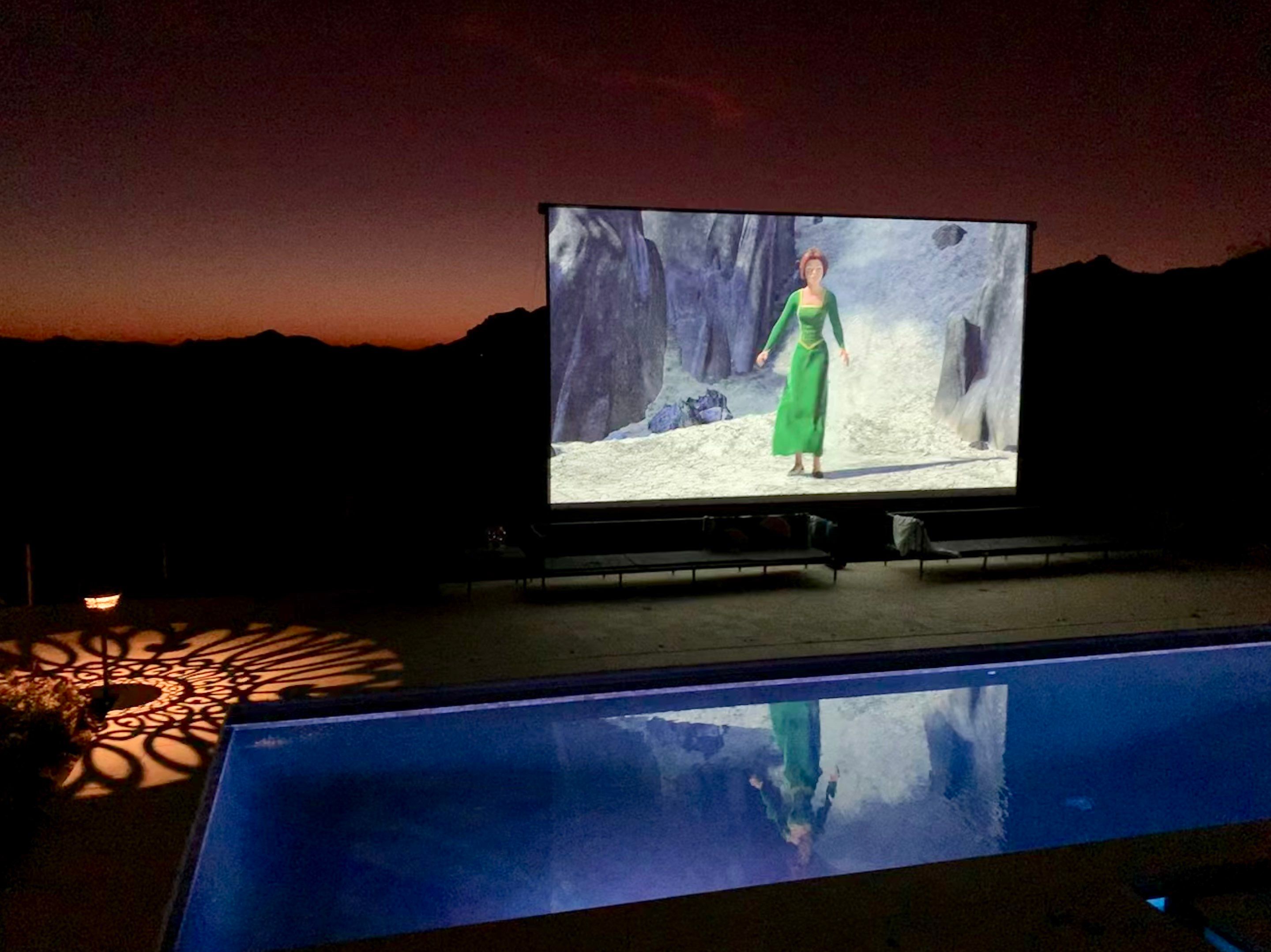 Malibu Hillside Outdoor Living Space with Custom Landscape Lighting + Surround Sound System by Outdoor Lights + Shades