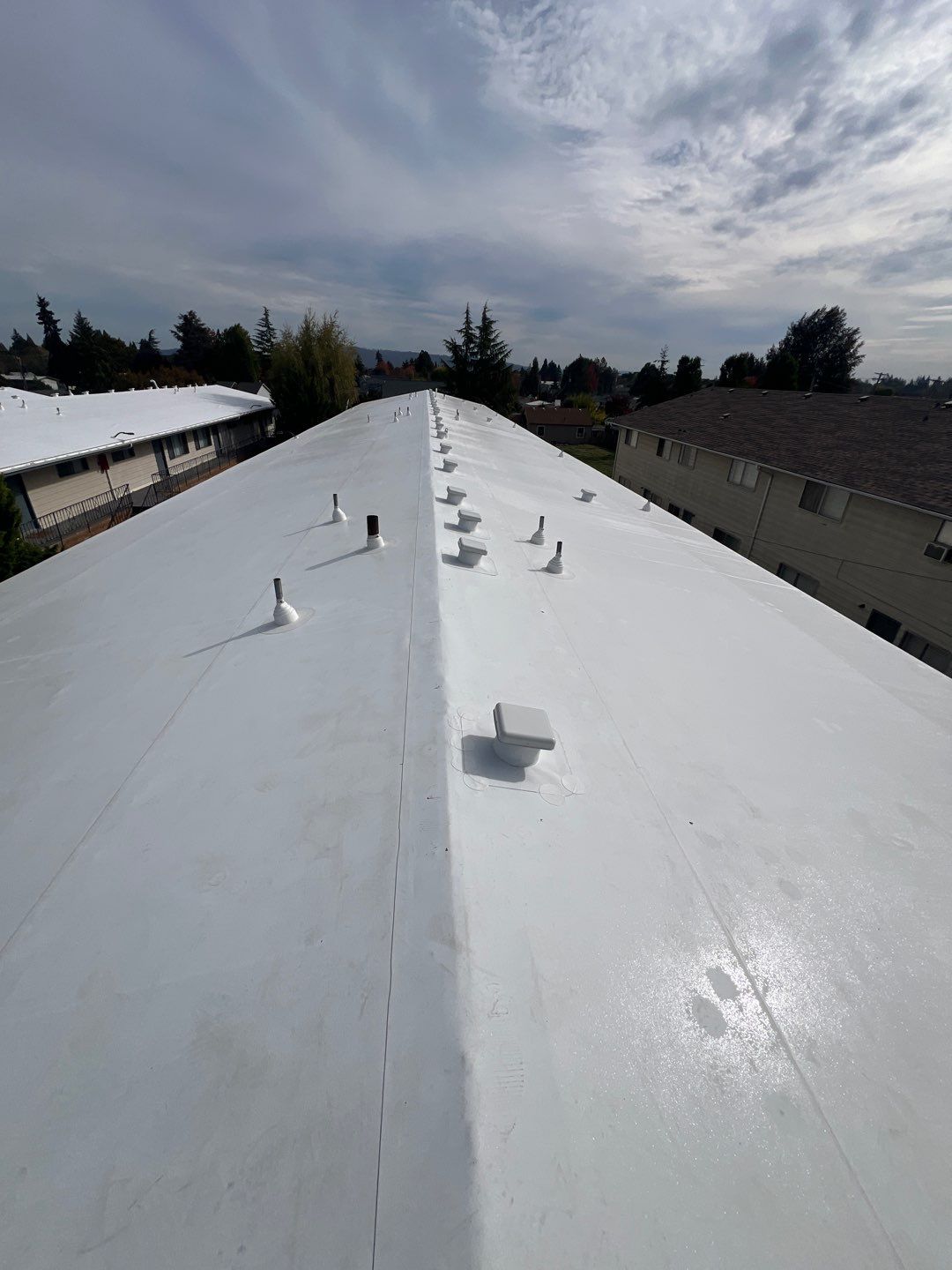 Commercial Flat Roof Installation using GAF 60Mil TPO  by Orezona Building & Roofing Company, Inc.