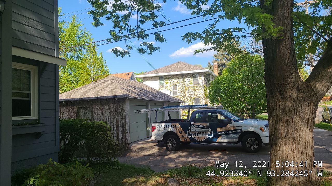 Minneapolis, MN – Roof and In-Roof Gutter System Replacement by First Impressions Exteriors