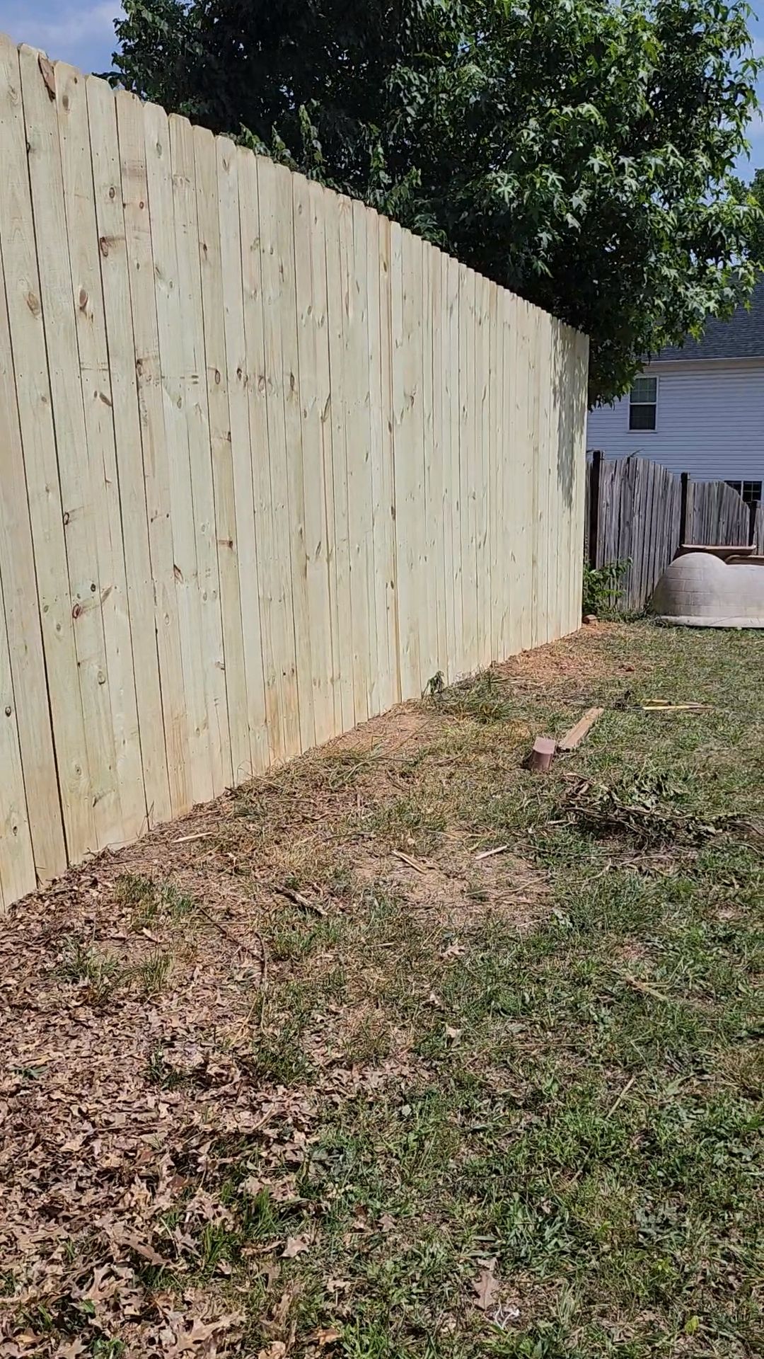 8 Foot Wood Privacy Fence Installation by Titans of Timber Fence & Stain