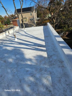 Residential Roofing Installation using TPO 