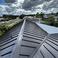 24ga 1.5" Mechanical Seam Dark Bronze by Total Roofing System The Metal Roof Experts