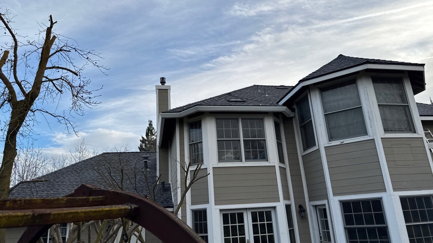 New shingles and gutters using GAF Timberline HDZ shingles and aluminum gutter by Straight Edge Roofing Inc